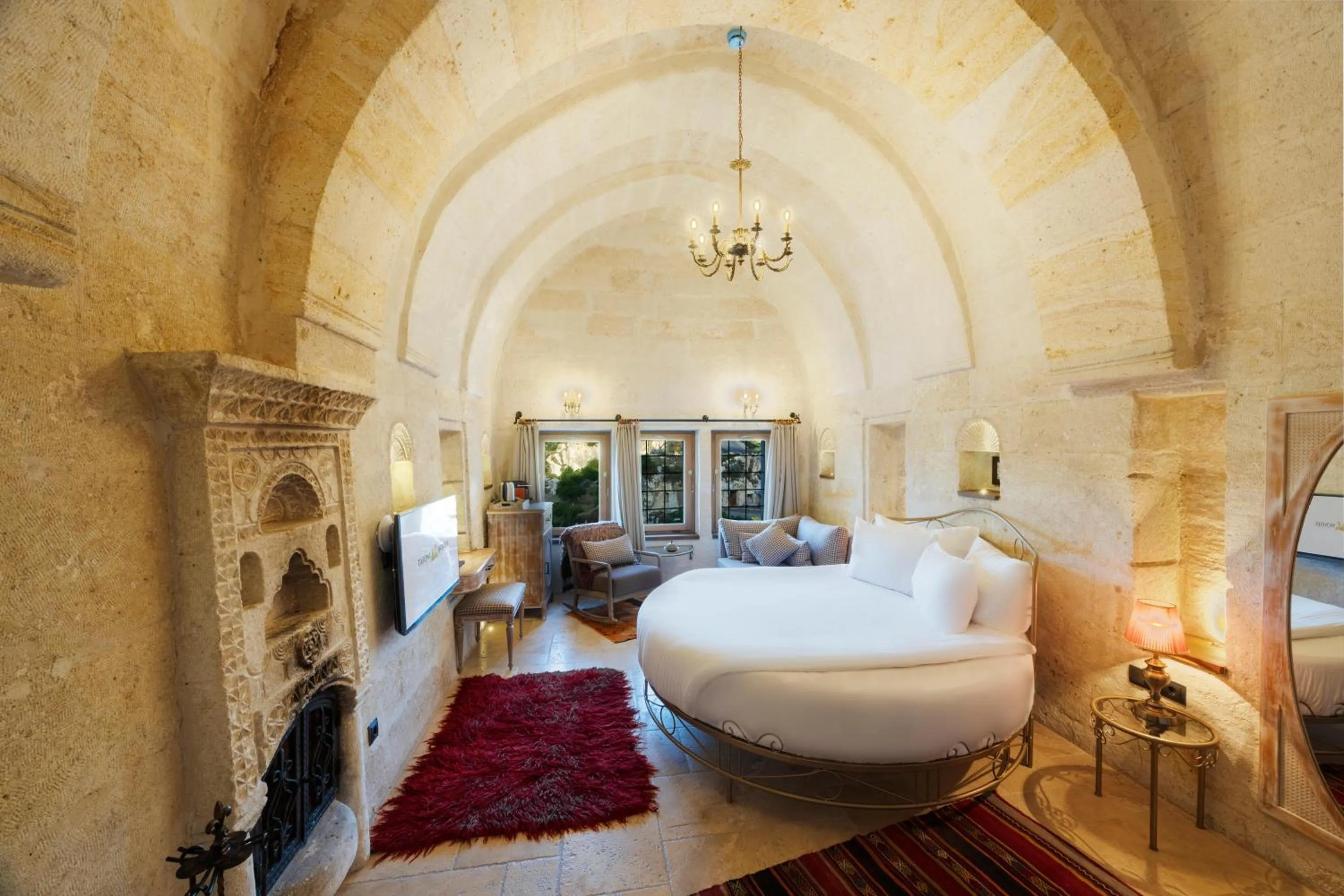 Lobby or reception, Bed in Tafoni Houses Cave Hotel