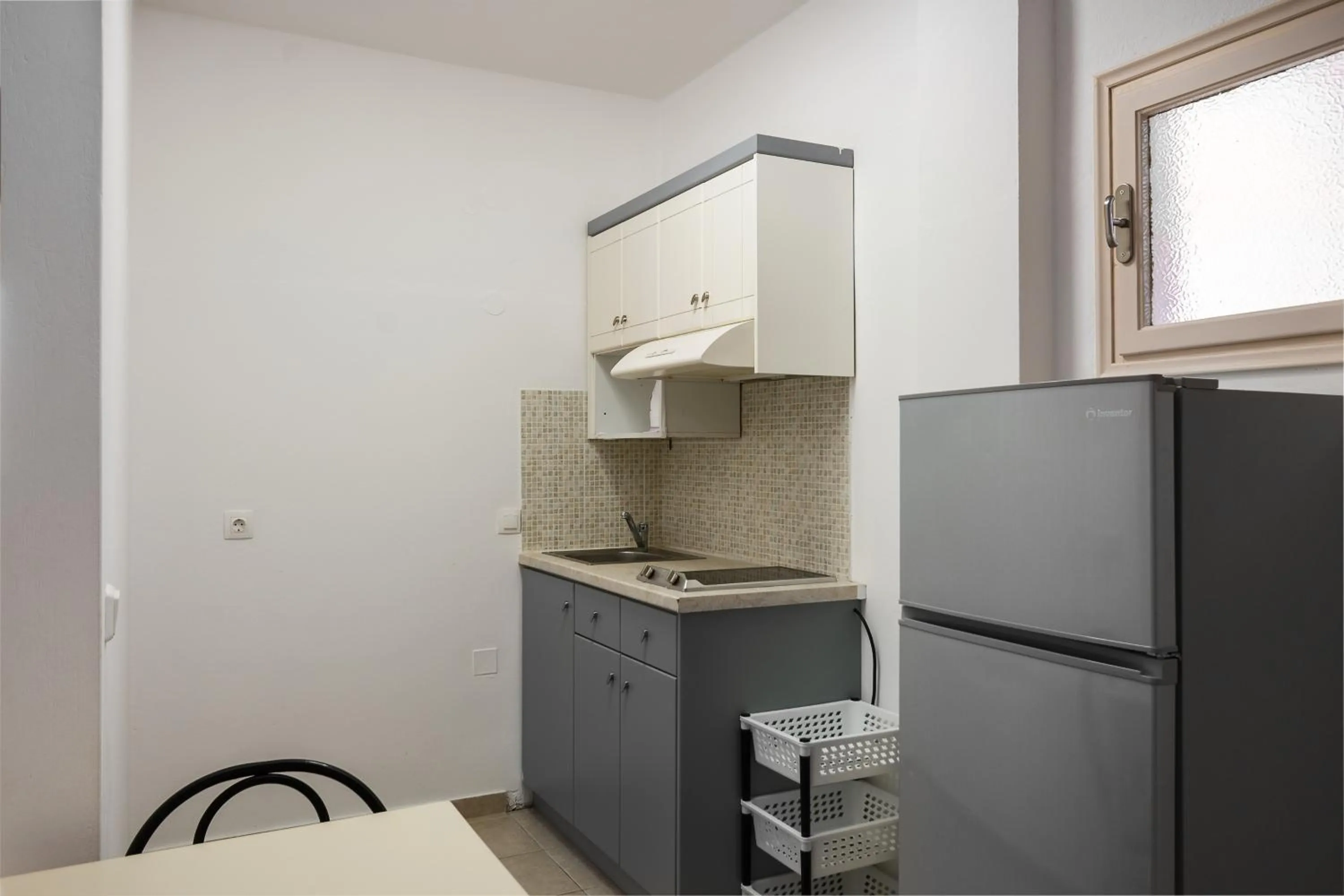 Kitchen or kitchenette in Filorian Hotel Apartments