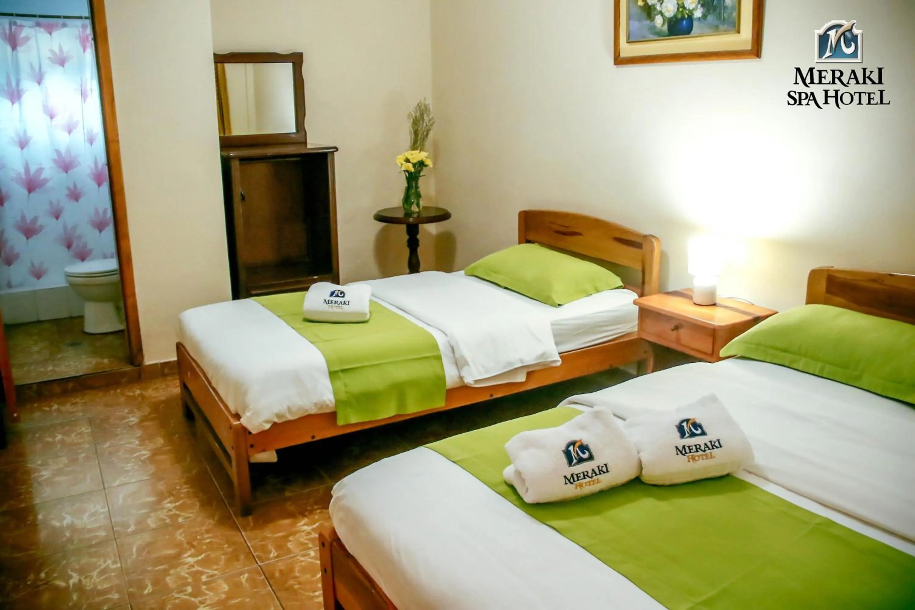 Bed in Meraki Hotel