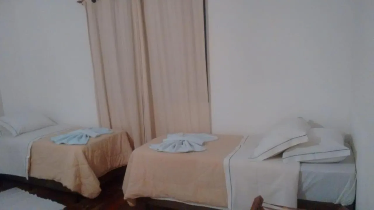 Bed in Pousada Aguape