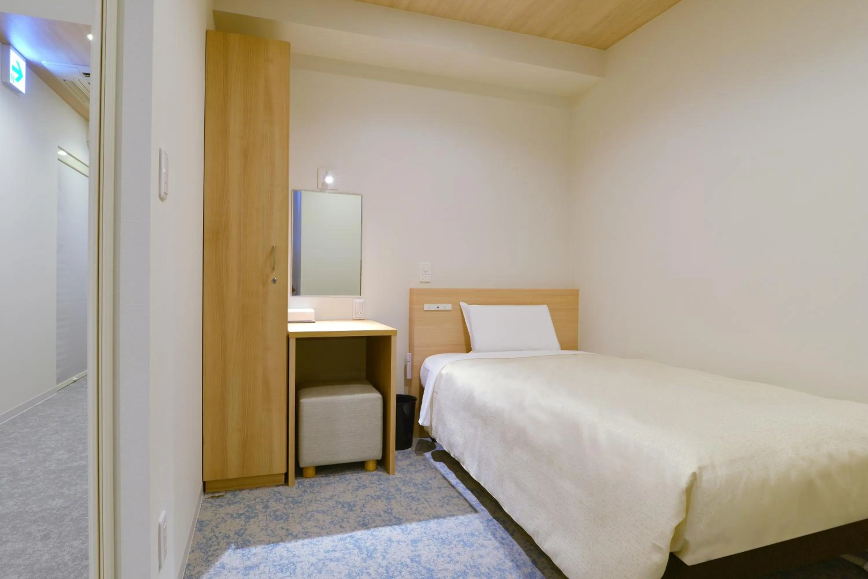 Bed in Hotel New Gaea Yakuin