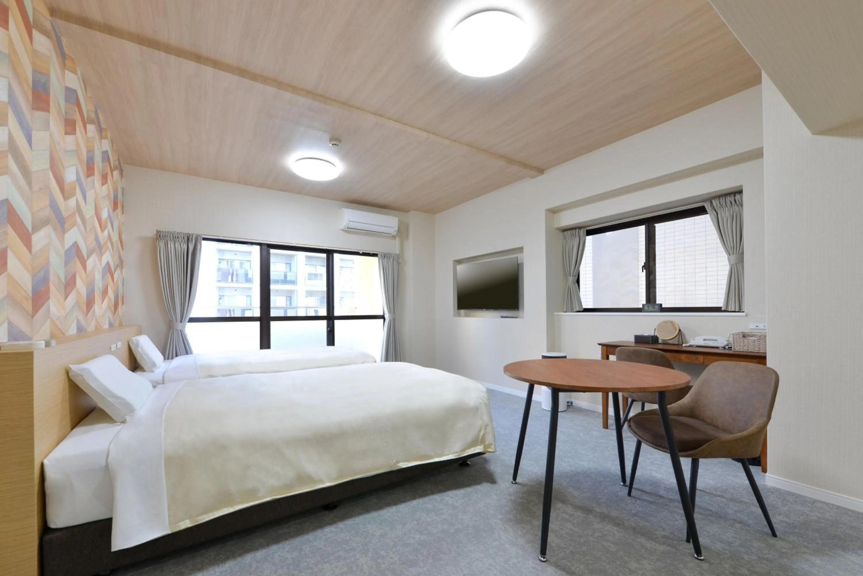 Bed in Hotel New Gaea Yakuin