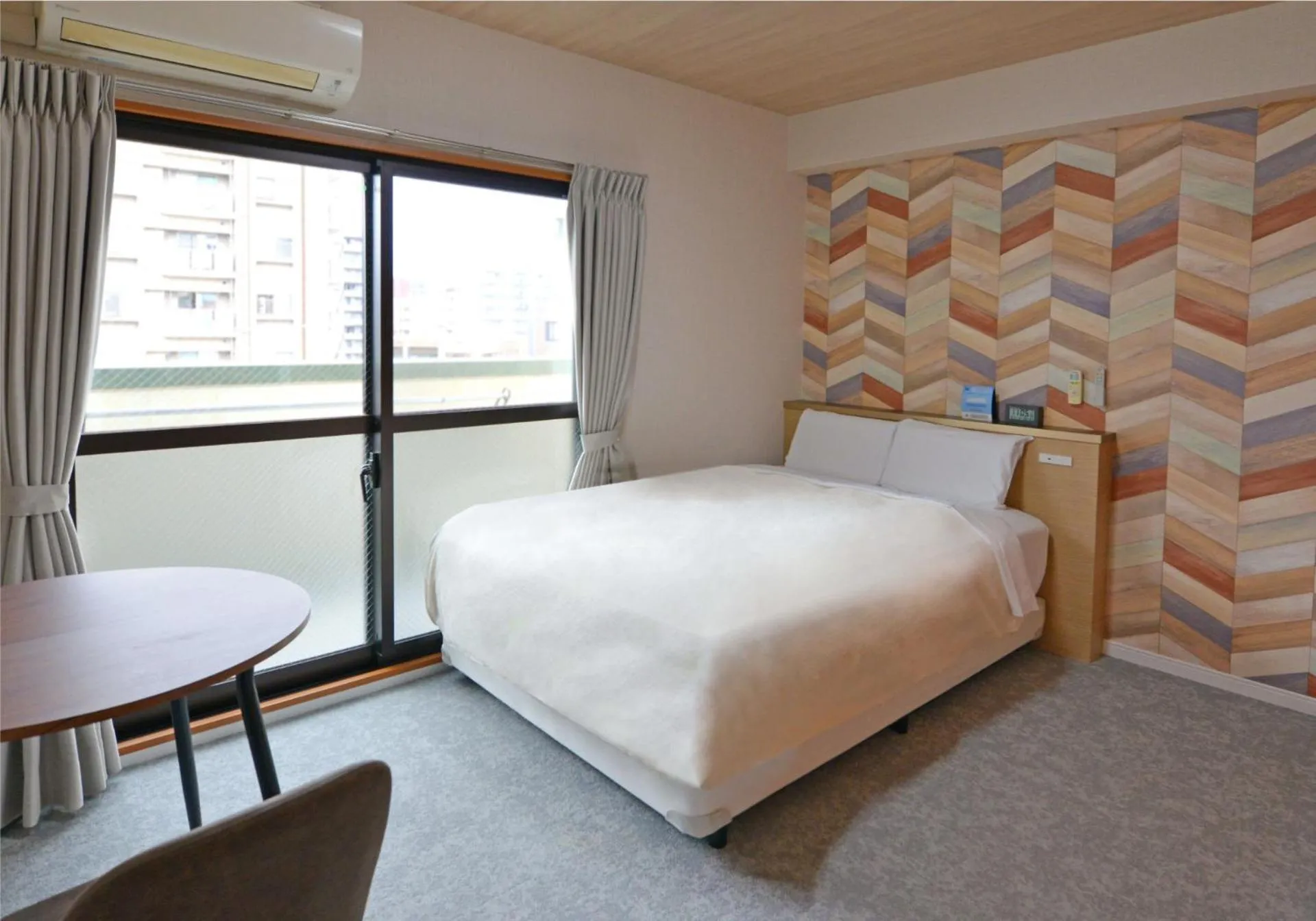 Bed in Hotel New Gaea Yakuin