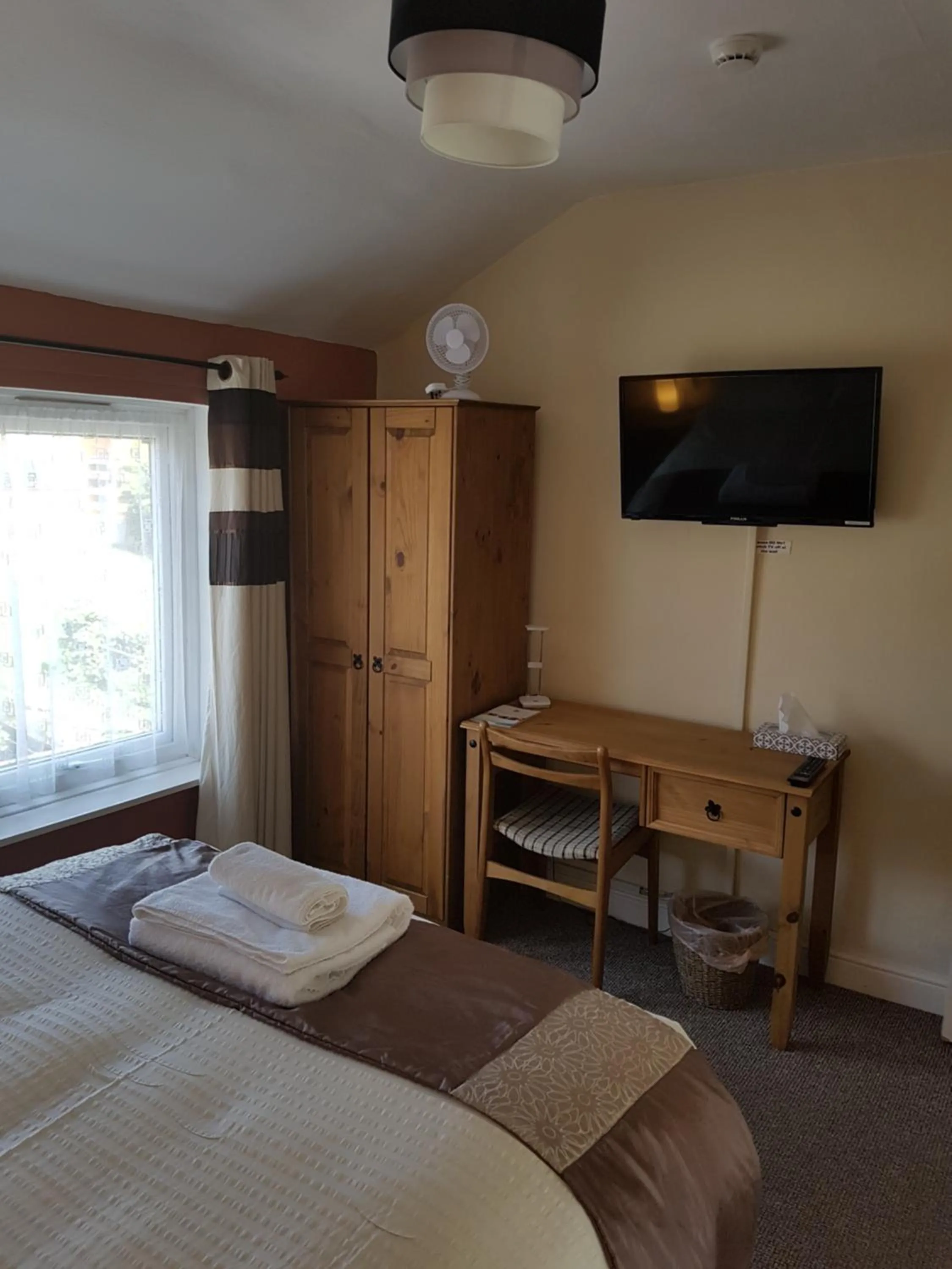 Bed in Riverside Guest House