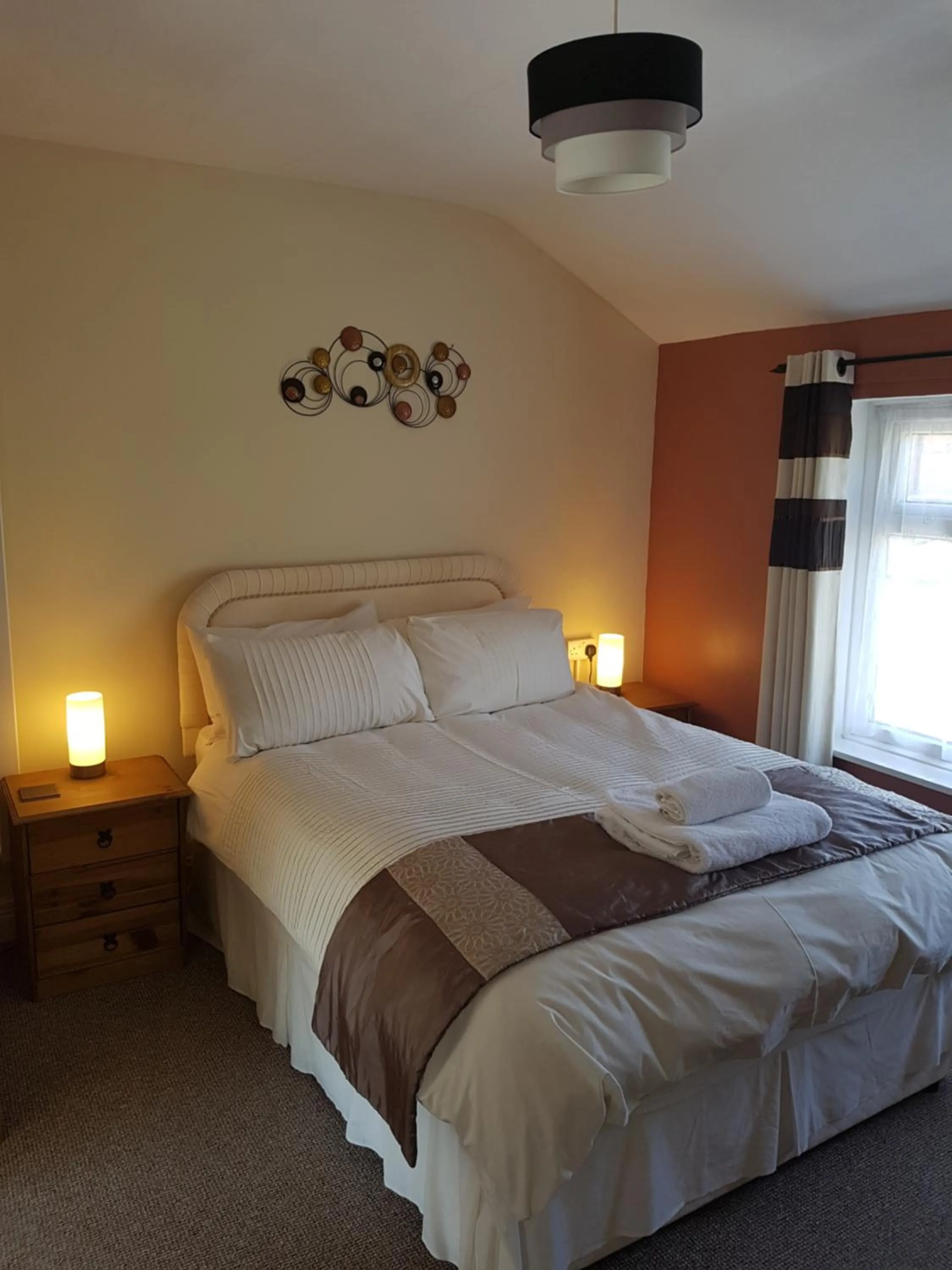 Bed in Riverside Guest House