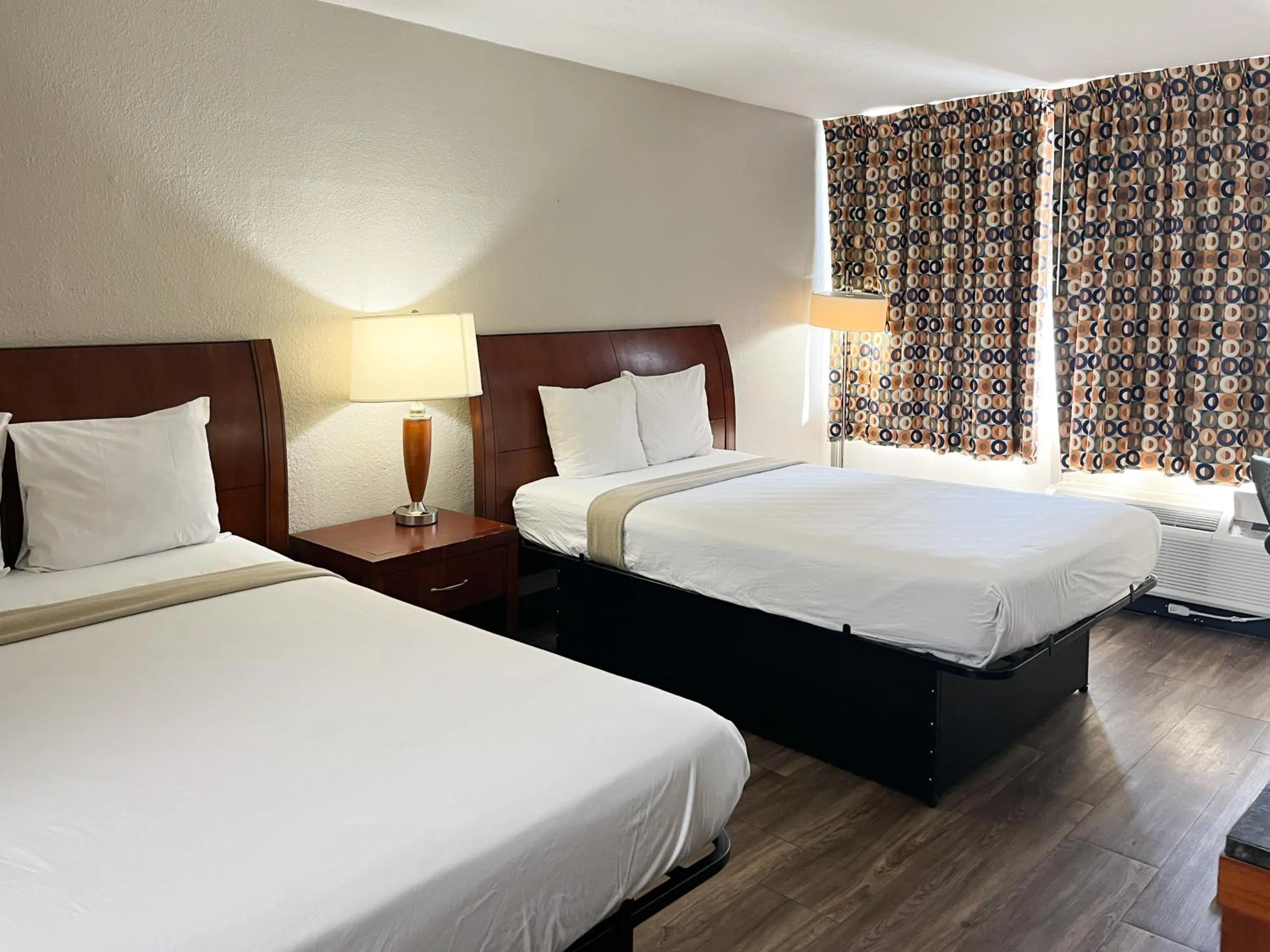 Bed in Motel 6 Raleigh, NC – Downtown South