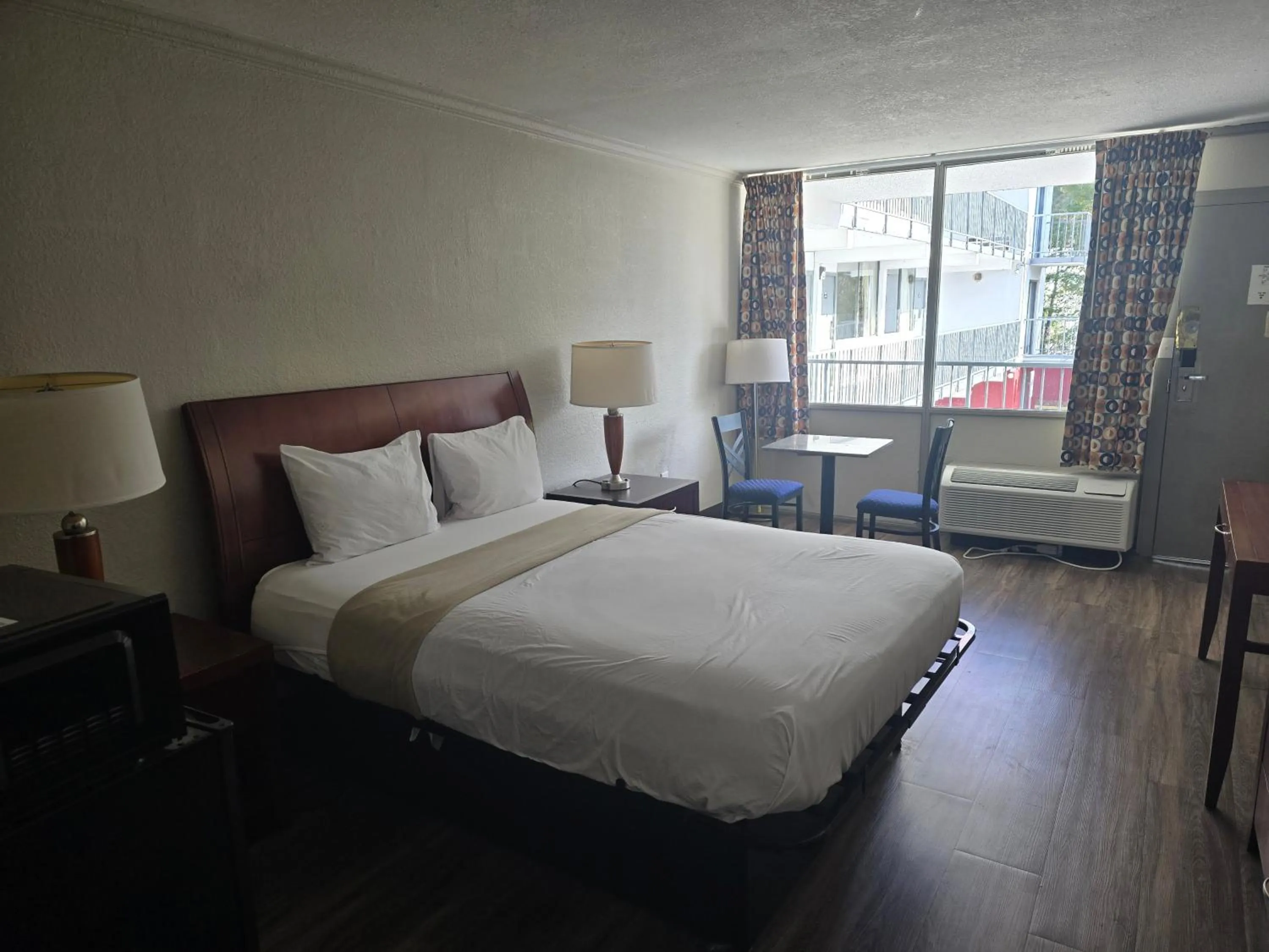 Bedroom in Days Inn by Wyndham Raleigh South