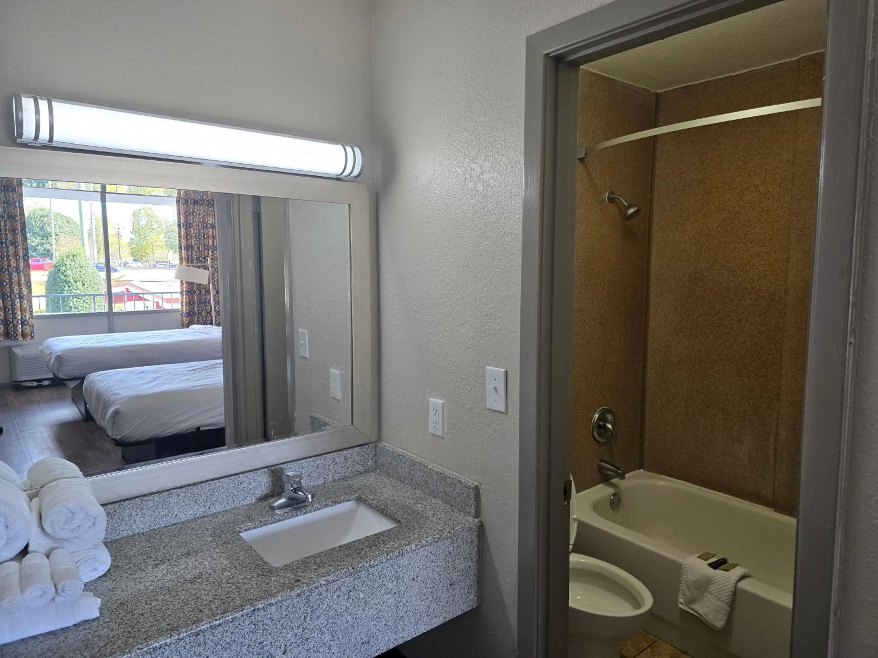 Bathroom in Days Inn by Wyndham Raleigh South