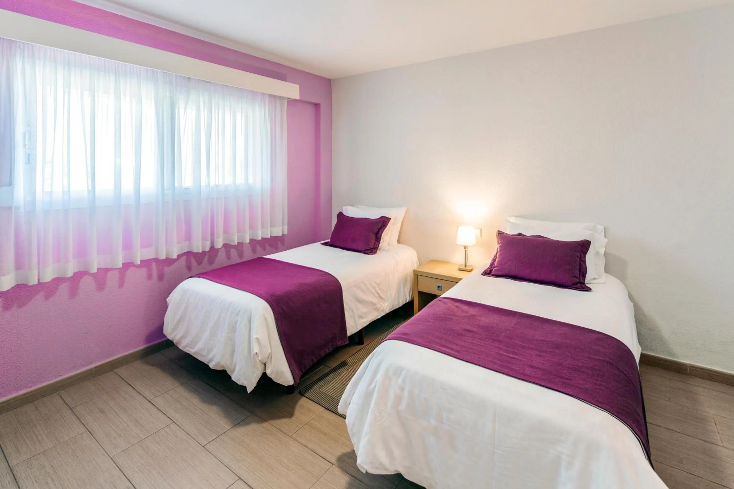 Bed in Ona Garden Lago