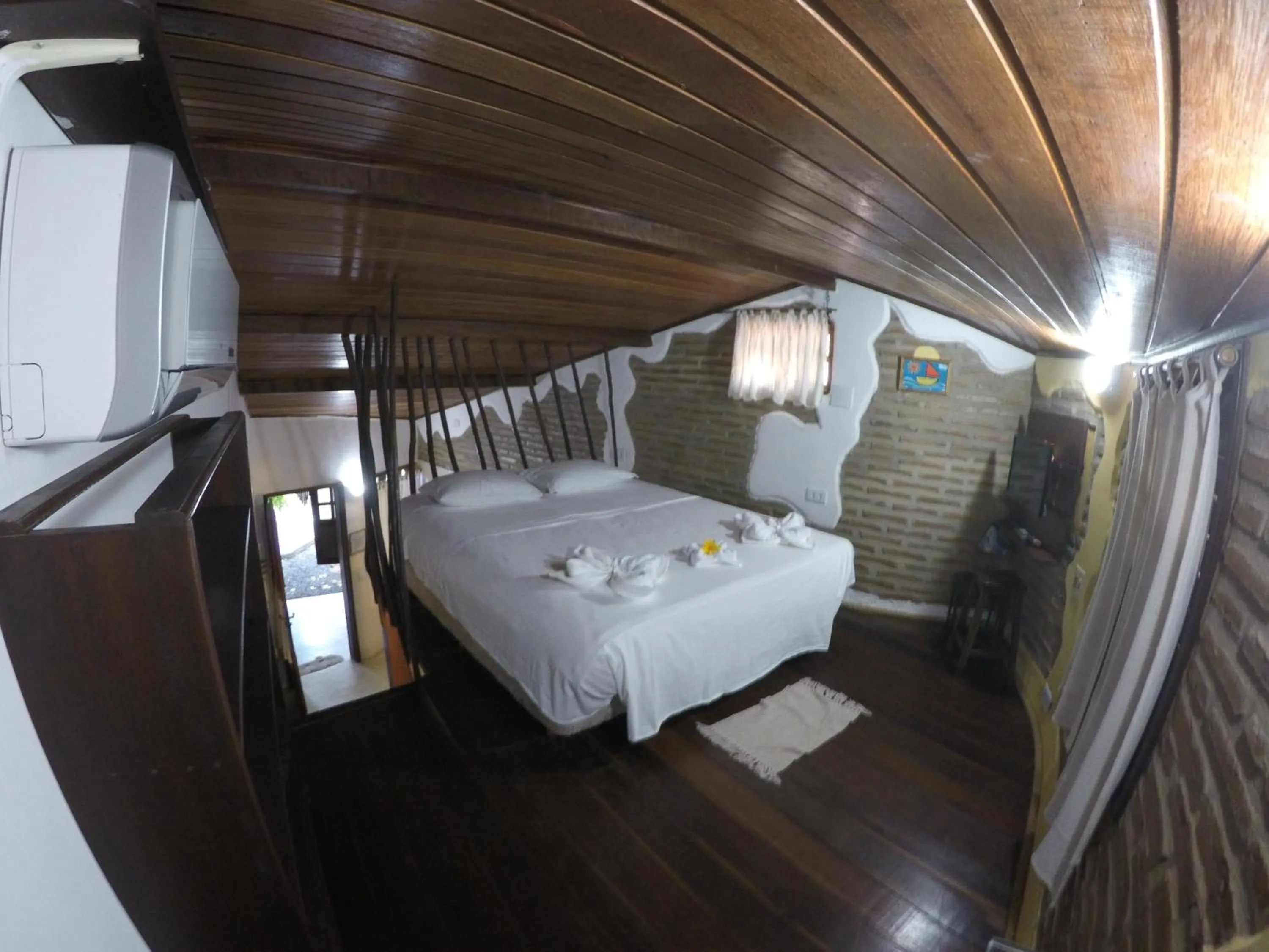 Bed in Pousada Ibirapuera