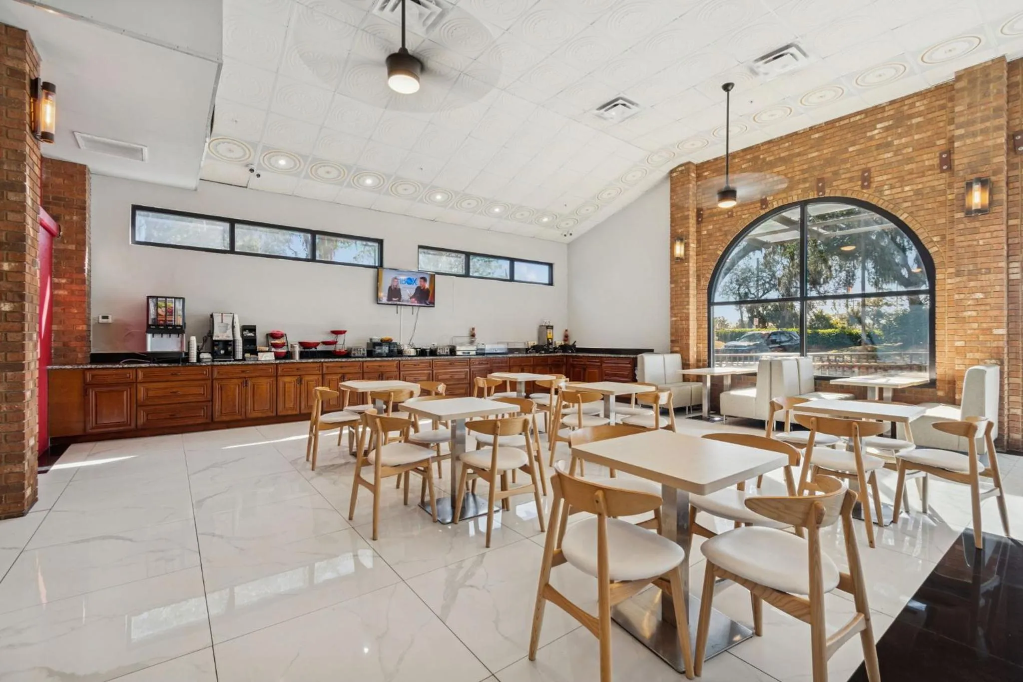 Seating area in Ramada by Wyndham Temple Terrace/Tampa North