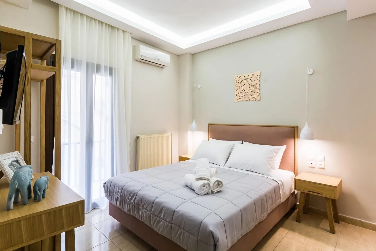 Bed in Alektor Luxury Apartments