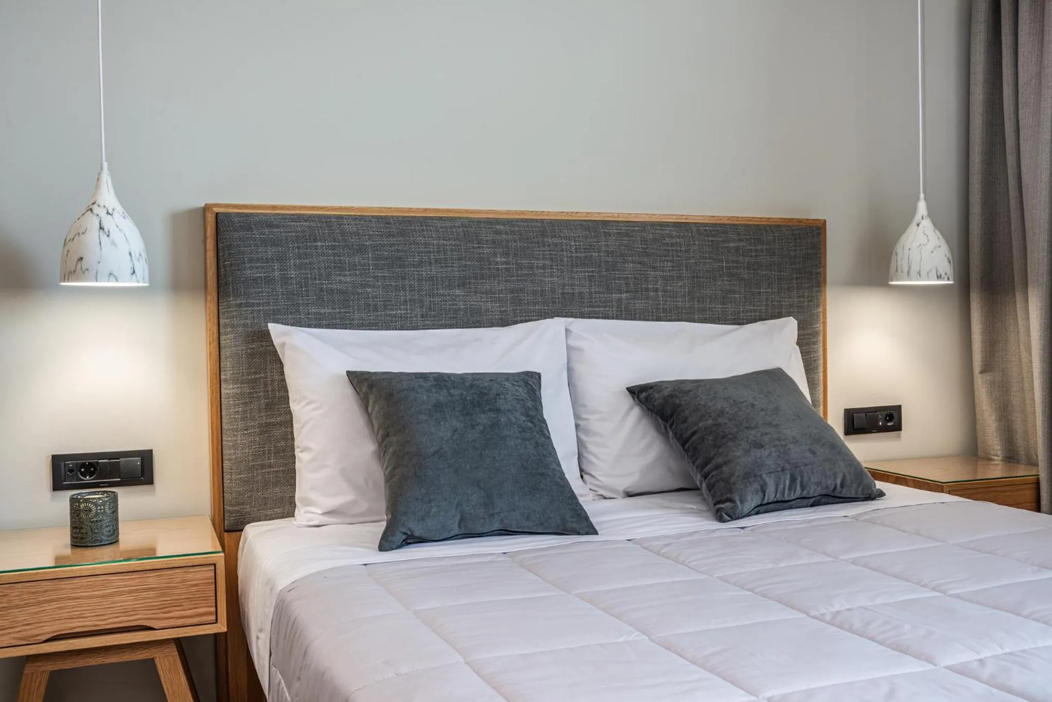 Bed in Alektor Luxury Apartments