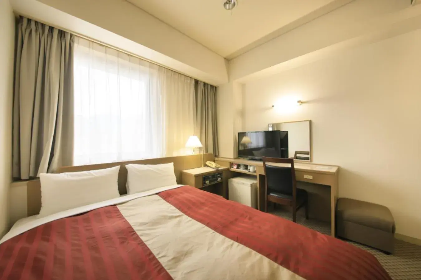 Bed in Hotel Nagano Avenue