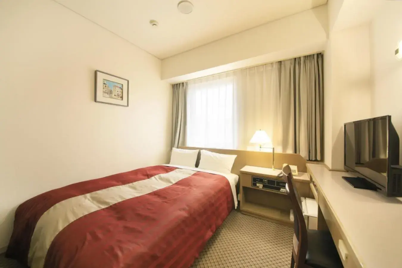 Bed in Hotel Nagano Avenue