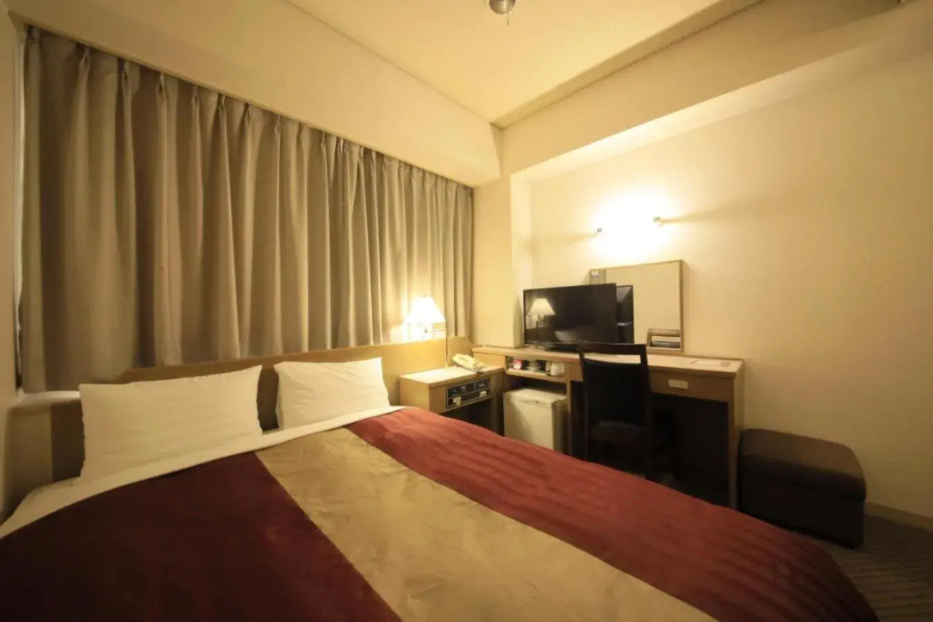 Bed in Hotel Nagano Avenue