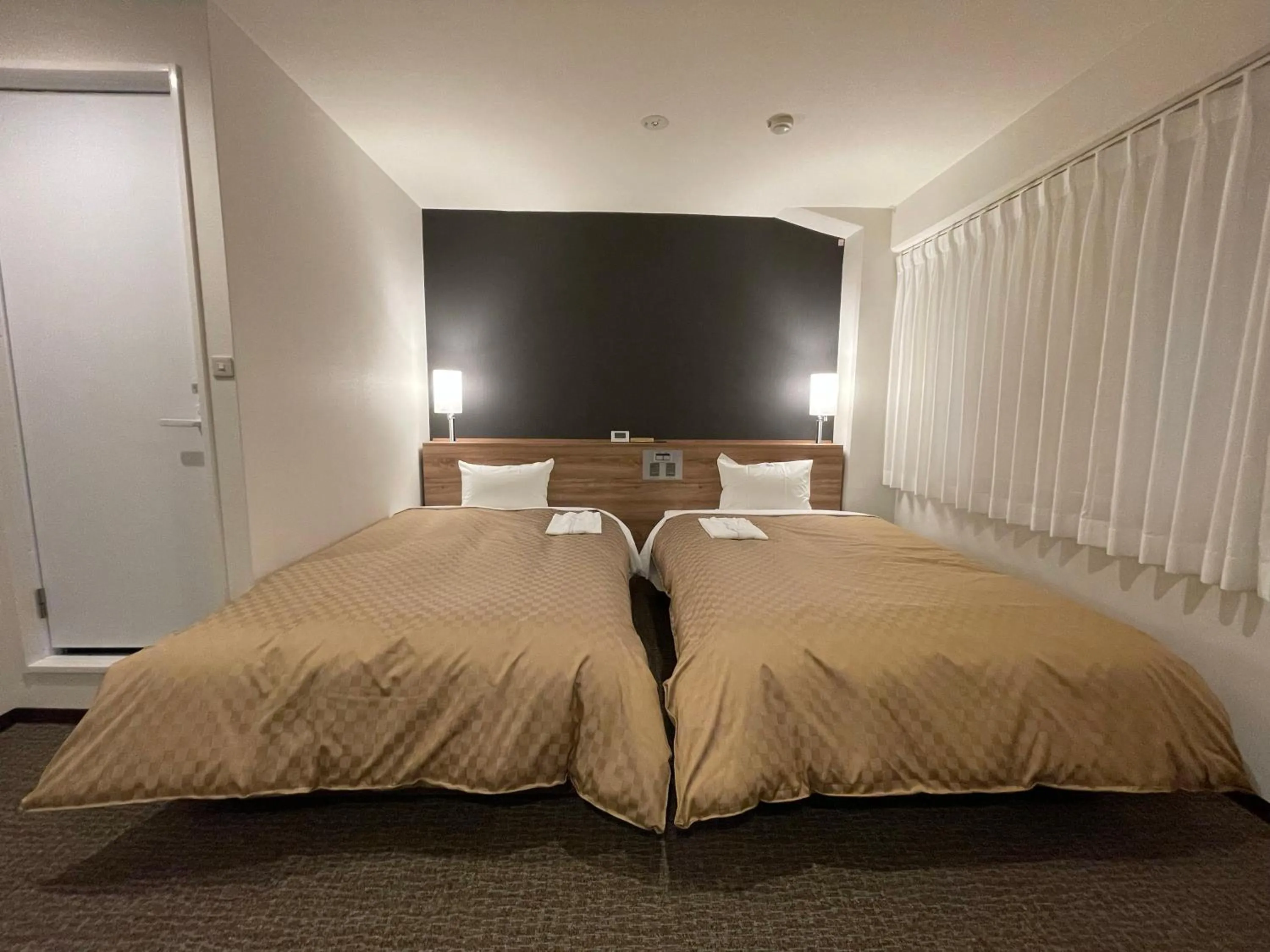 Bedroom, Bed in Kusatsu Daiichi Hotel