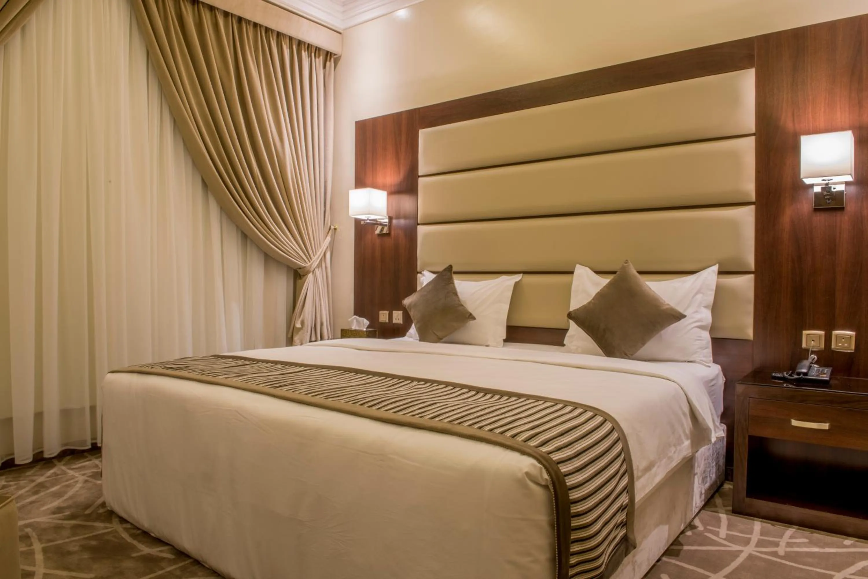 Bed in نورمينا الشرق للشقق المخدومة