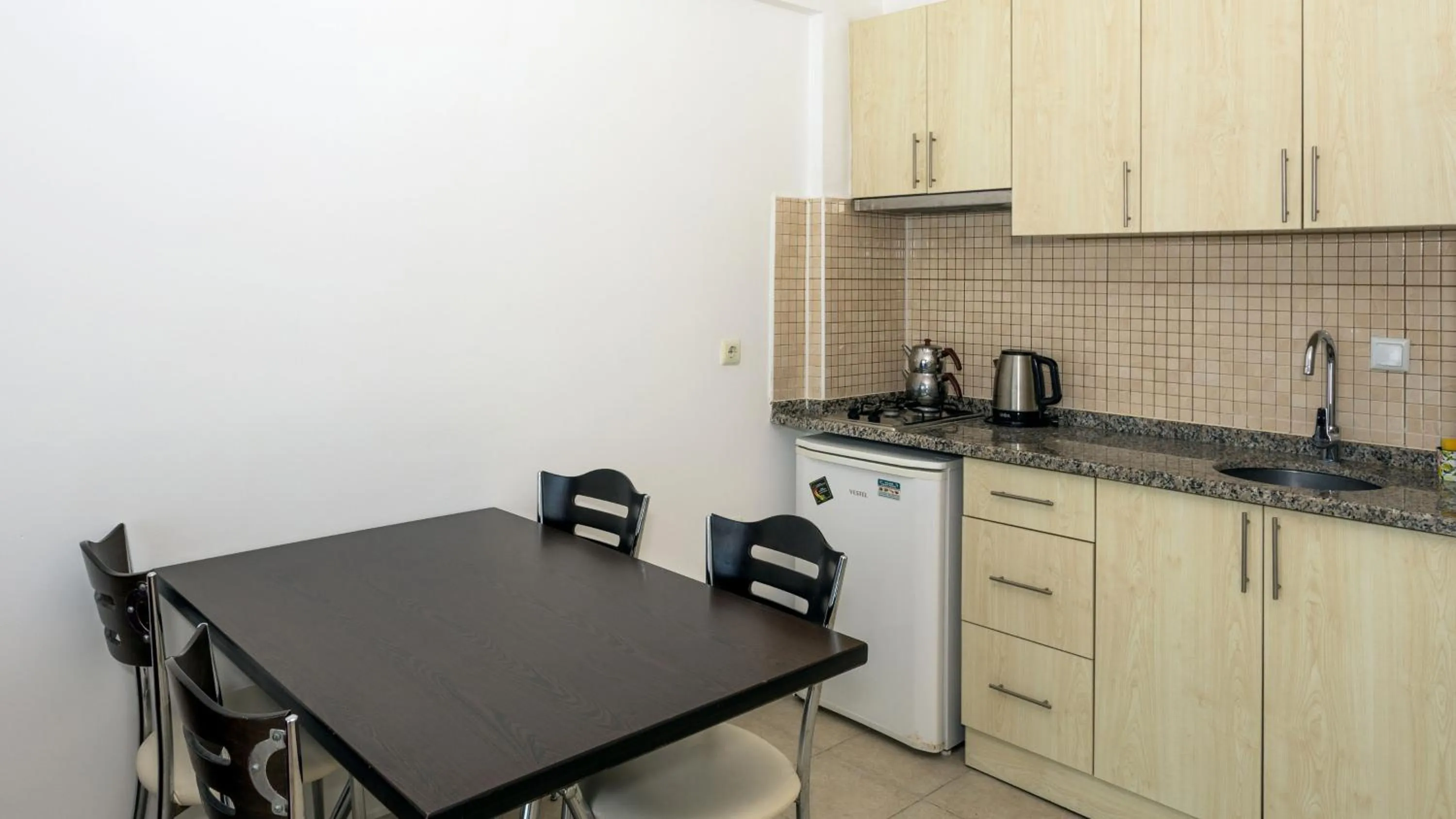 Kitchen or kitchenette in Kerem Apart Hotel
