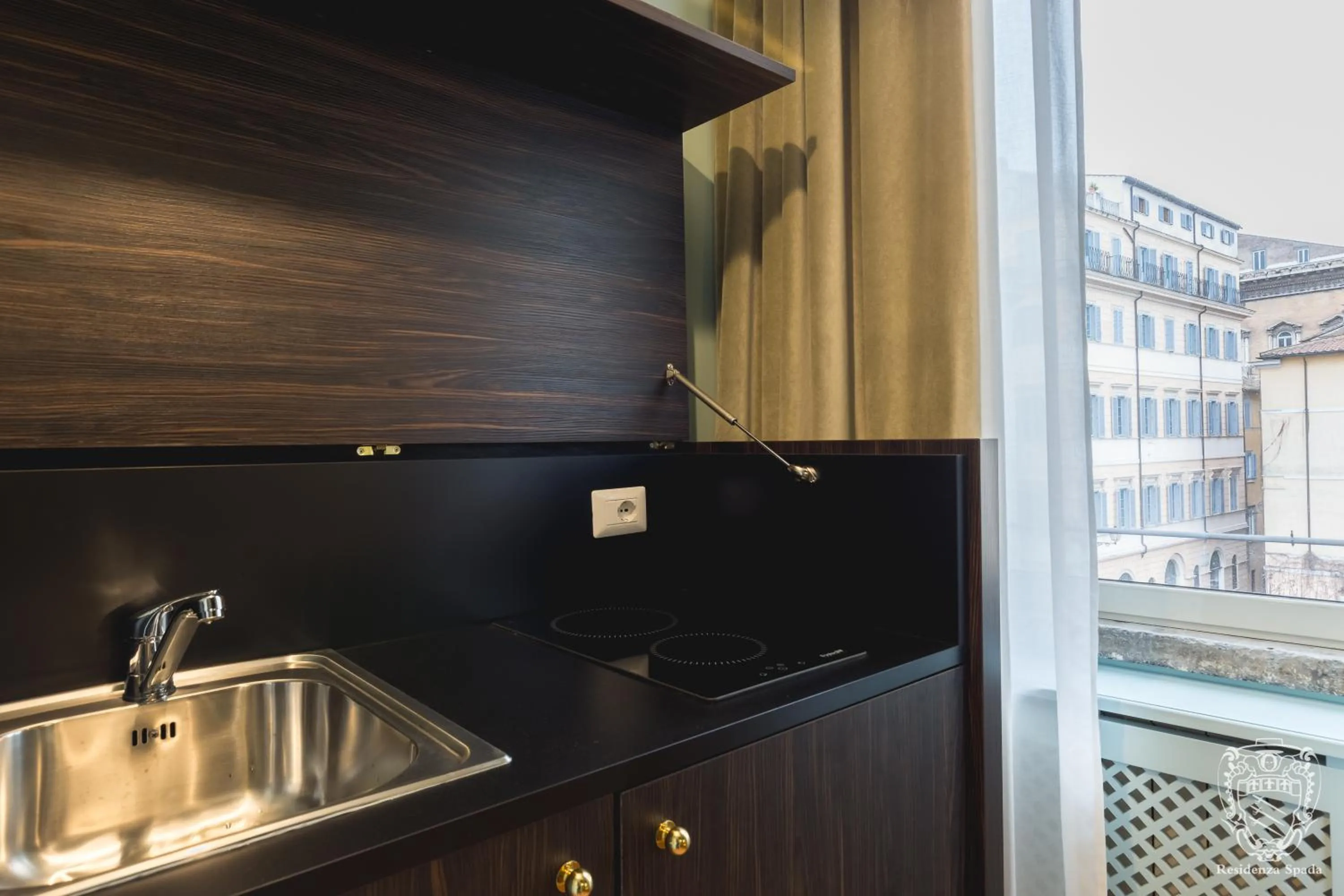 Kitchen or kitchenette in Residenza Spada