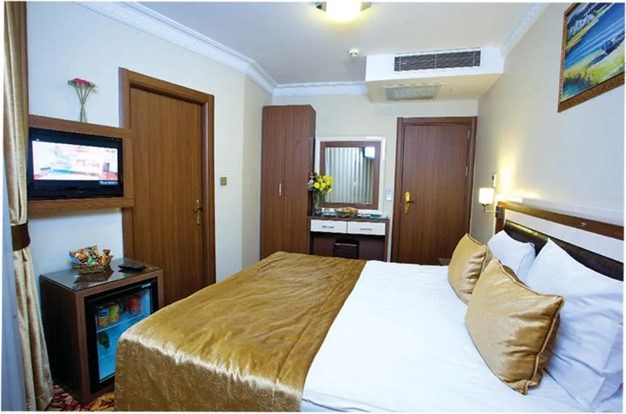 Bed in Grand Anatolia Hotel