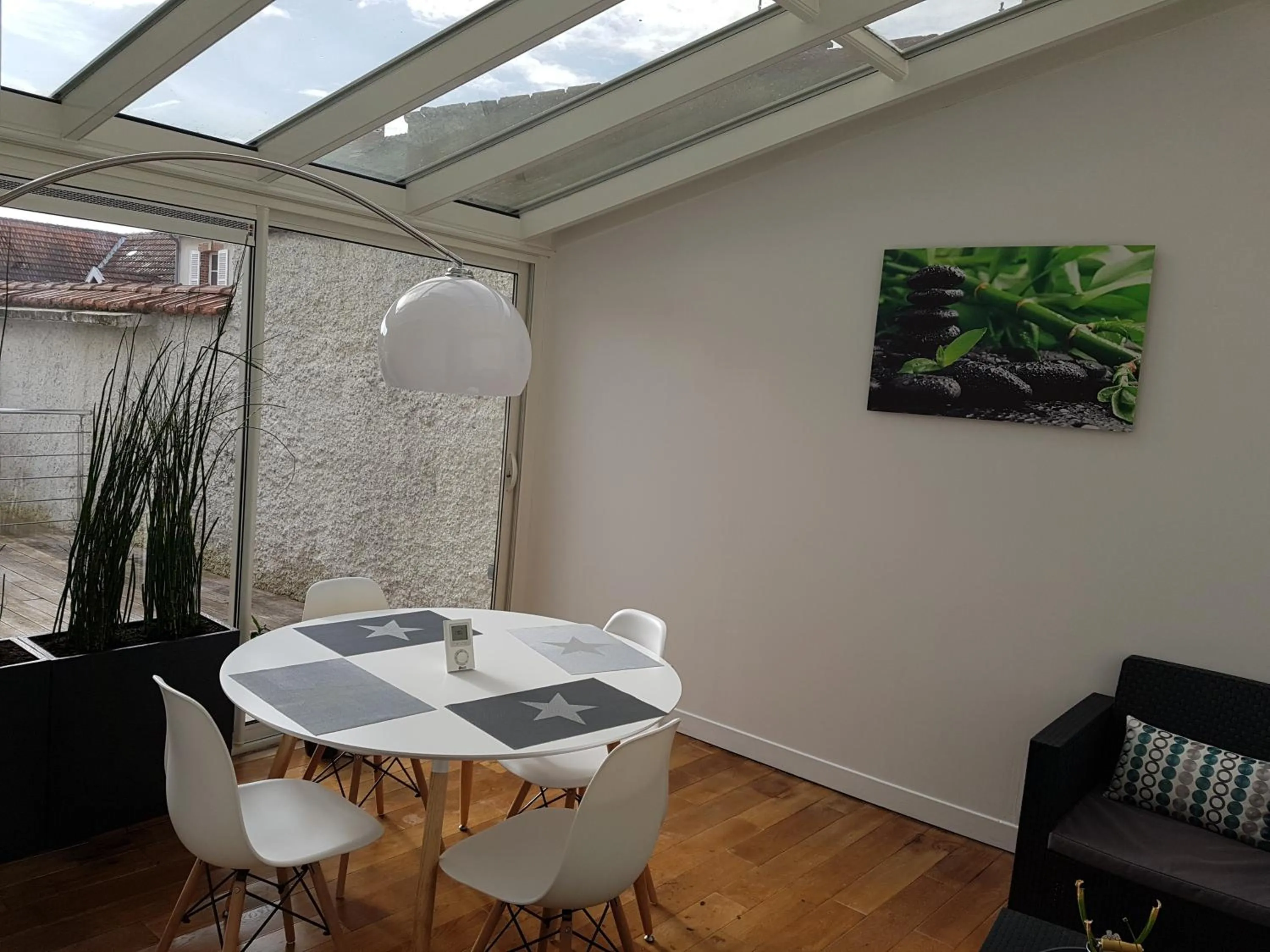 Patio in L'Iliade - Chambres d'hôtes - B&B à Bouzy