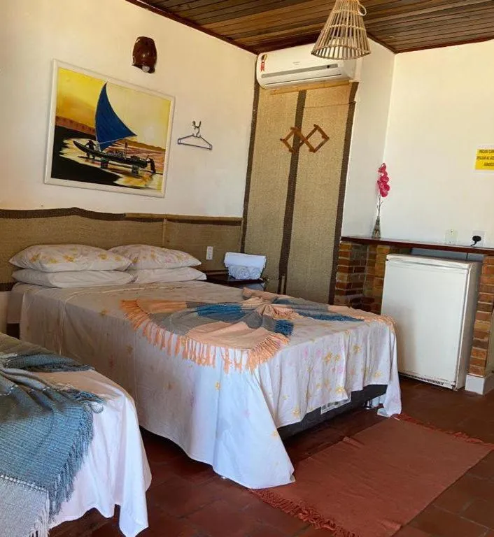 Bed in Pousada Brésil Aventure