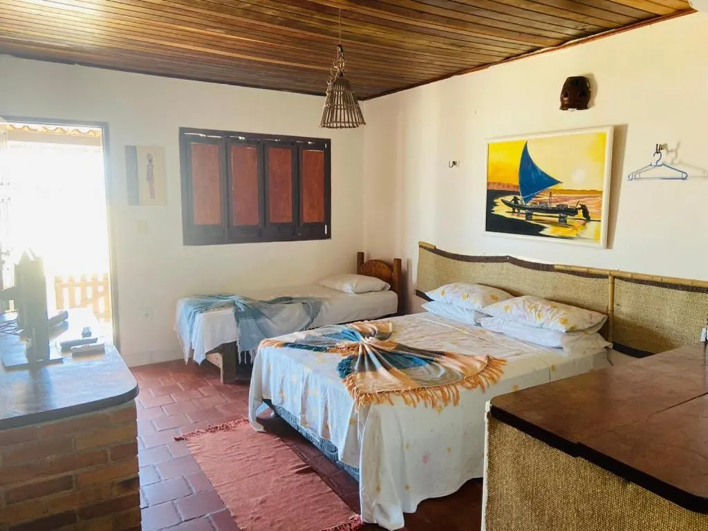 Bed in Pousada Brésil Aventure