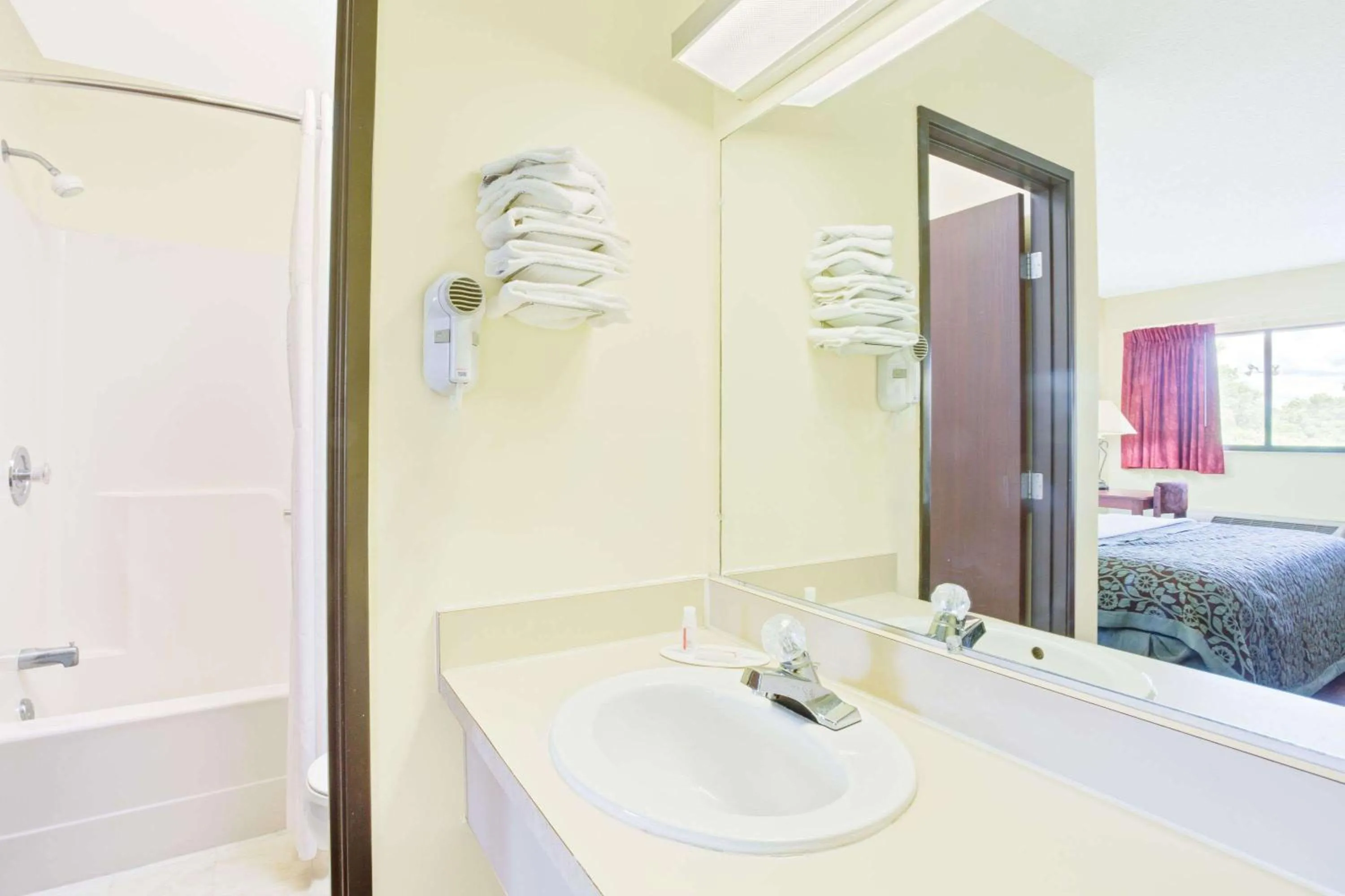 Bathroom, Bed in Days Inn by Wyndham Athens