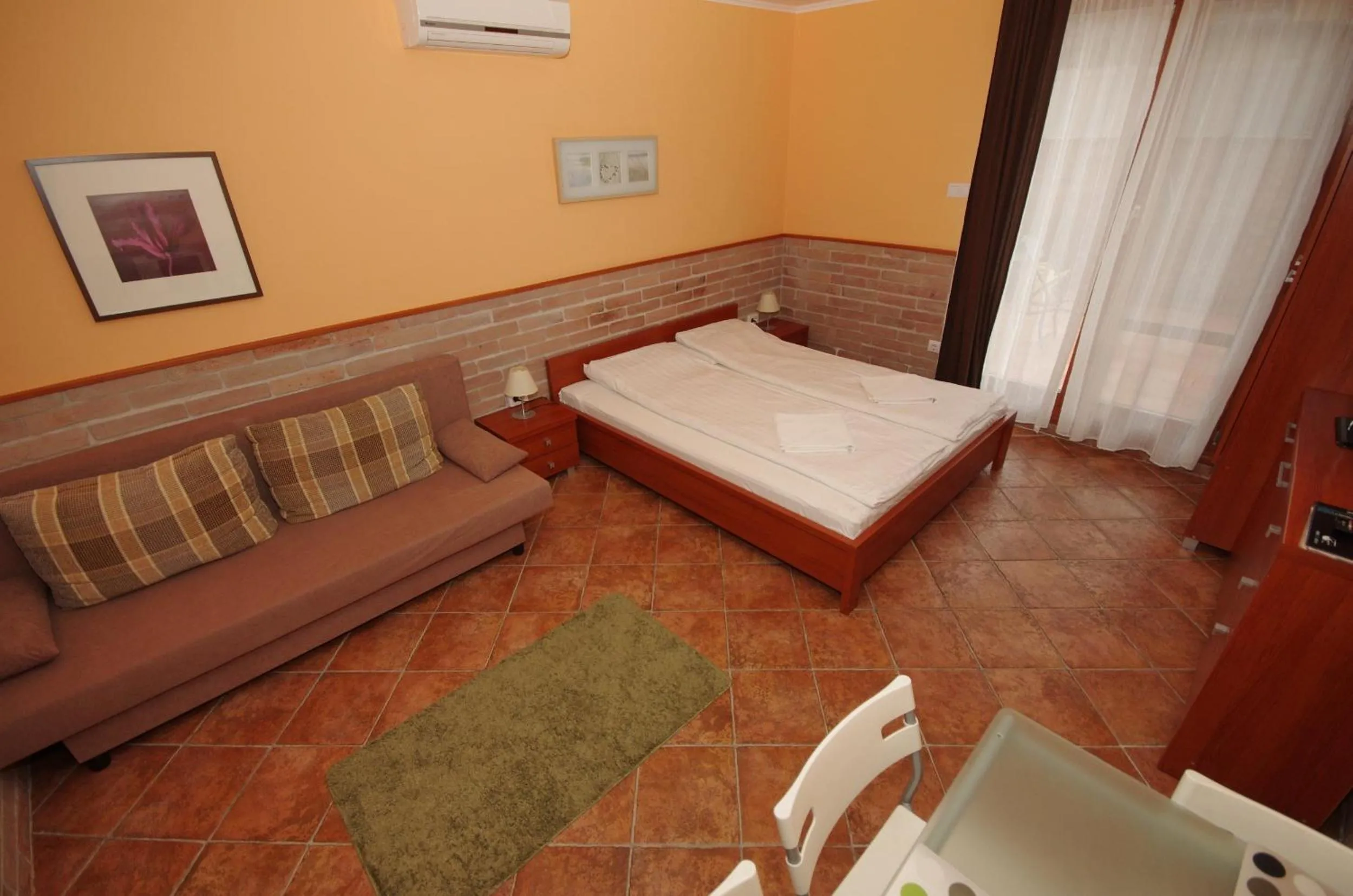 Bed in Várárok Apartman