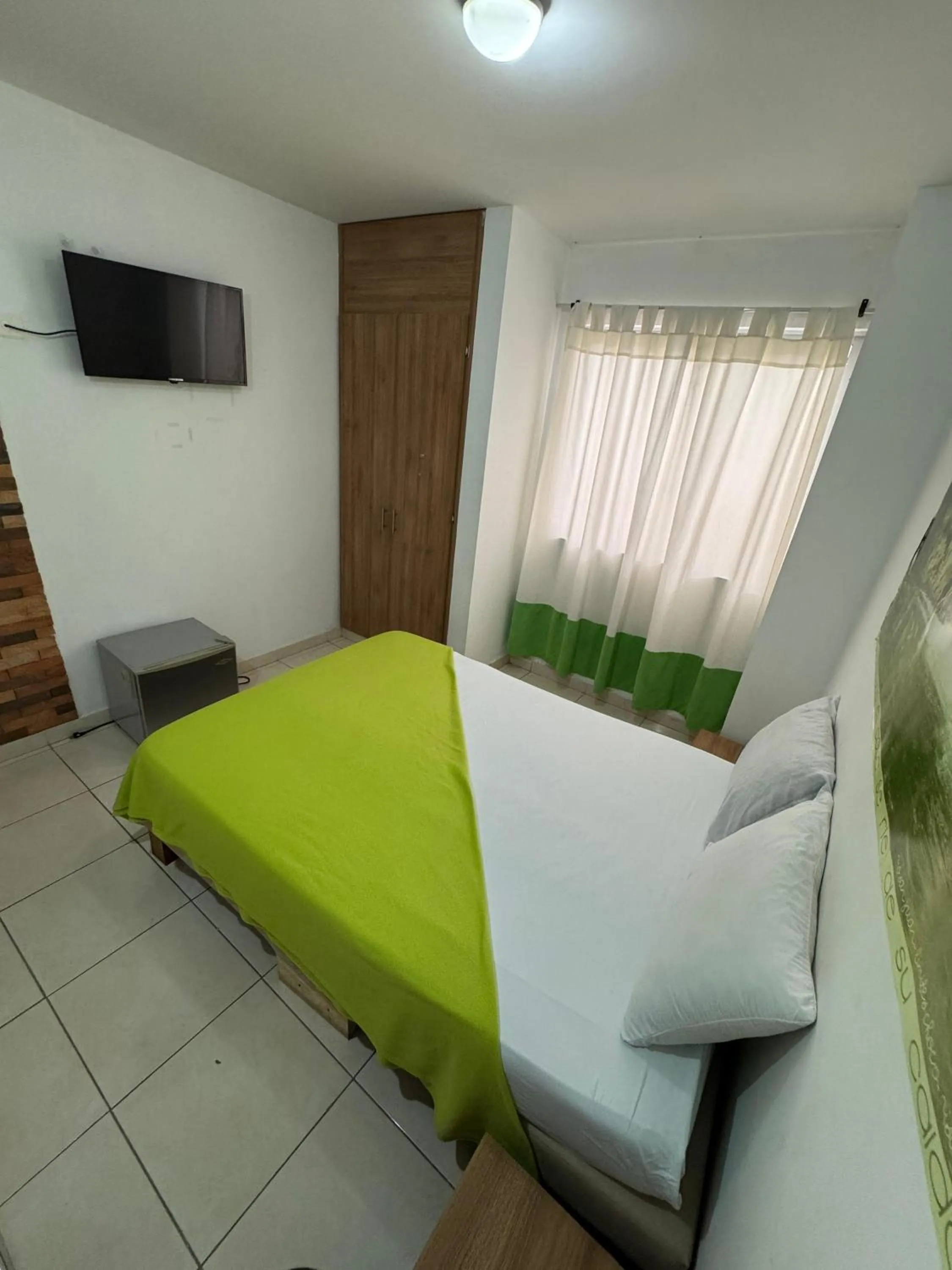 Bed in Hotel Condina Pereira