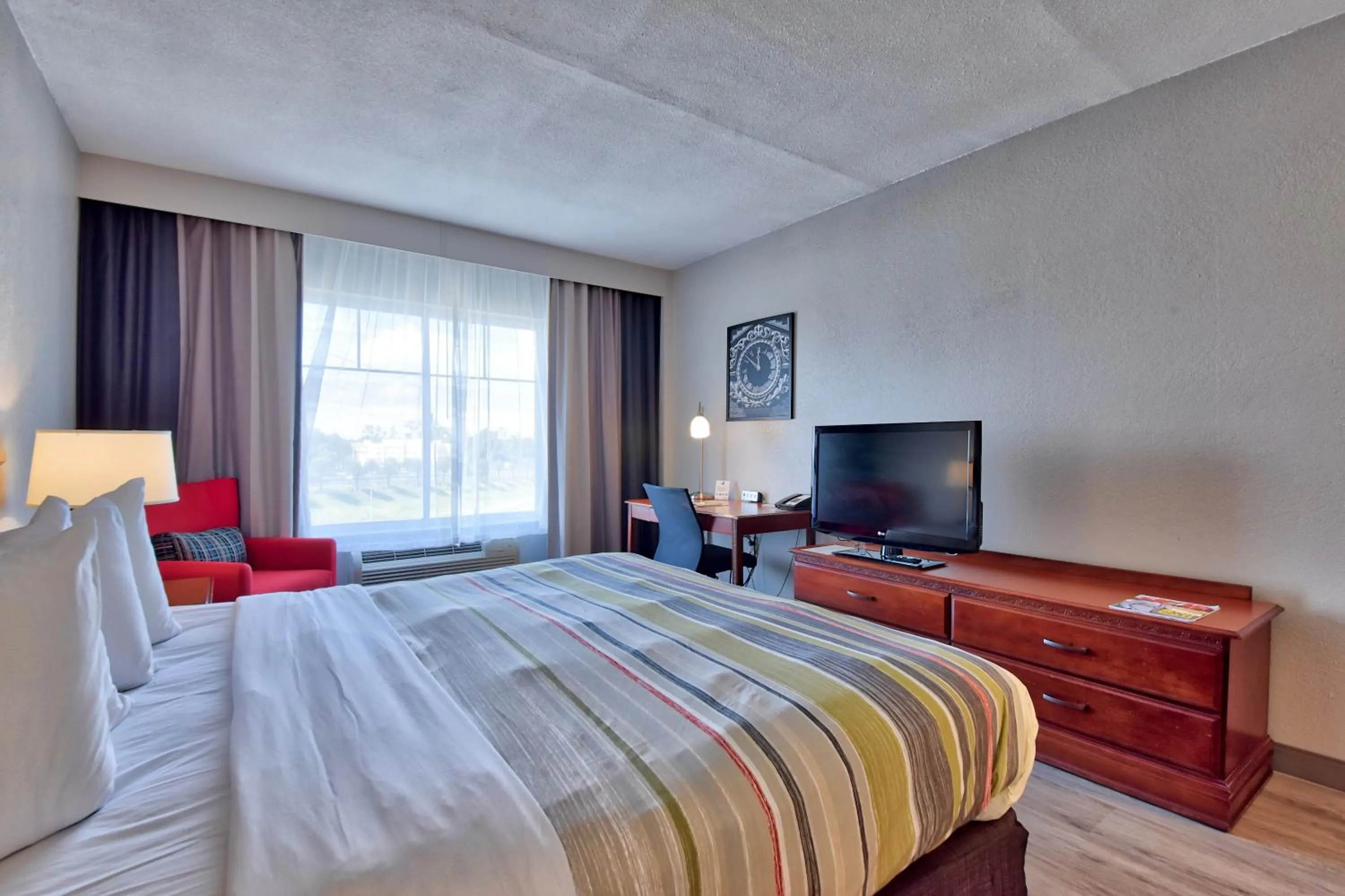 Bed in Country Inn & Suites by Radisson Ocala Southwest