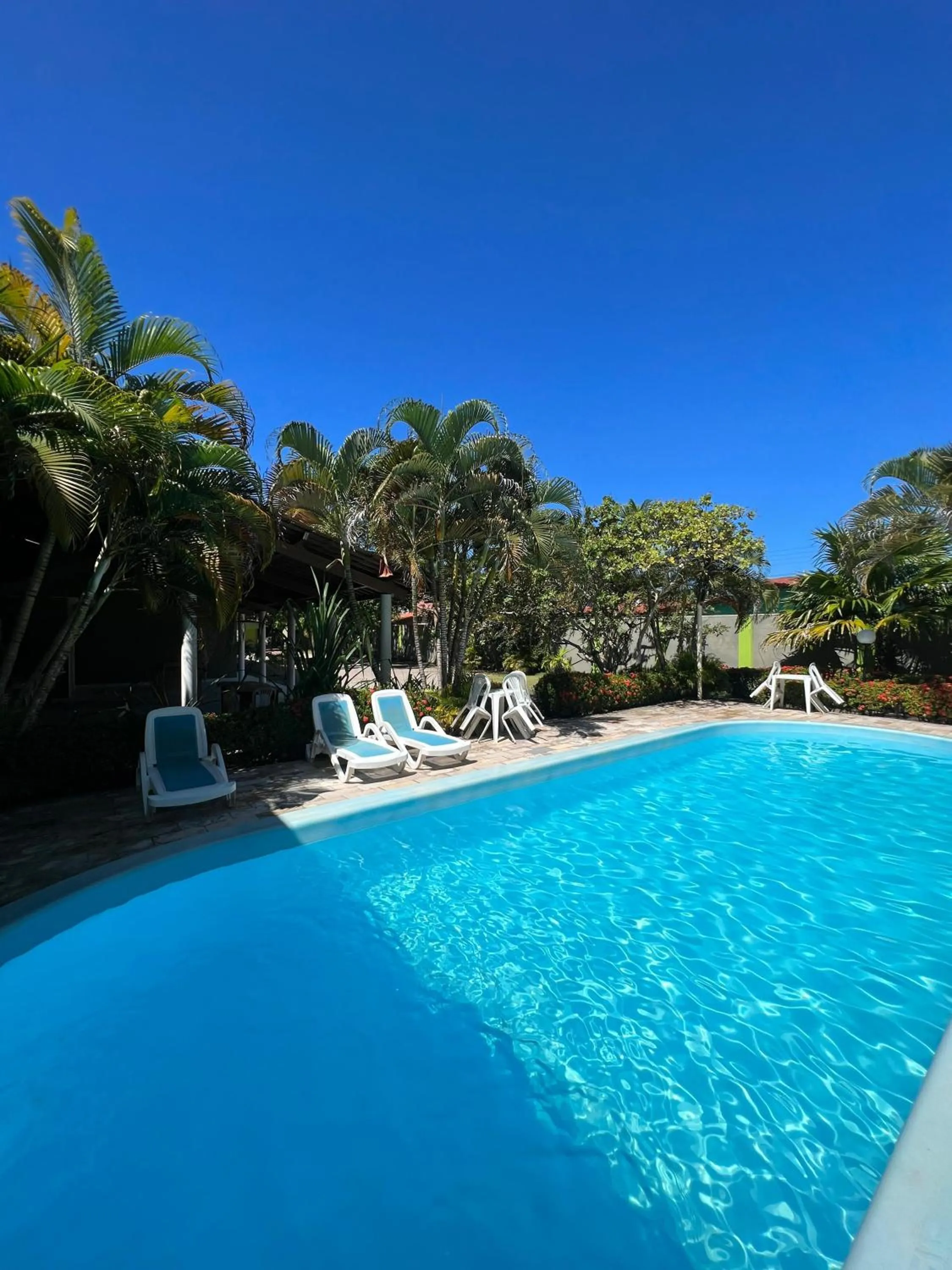 Swimming pool in Pousada o Caribe de Maragogi