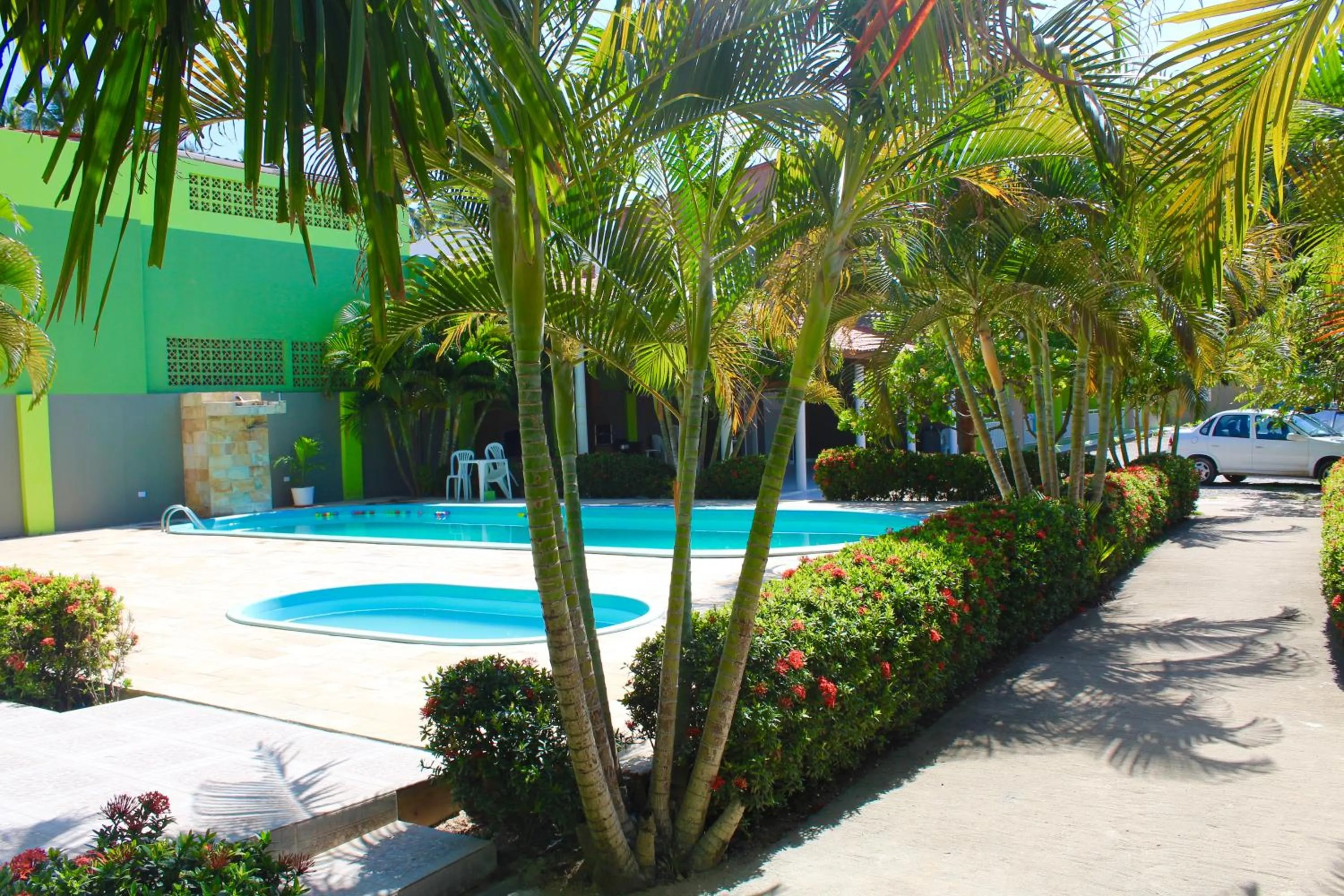 Swimming pool in Pousada o Caribe de Maragogi