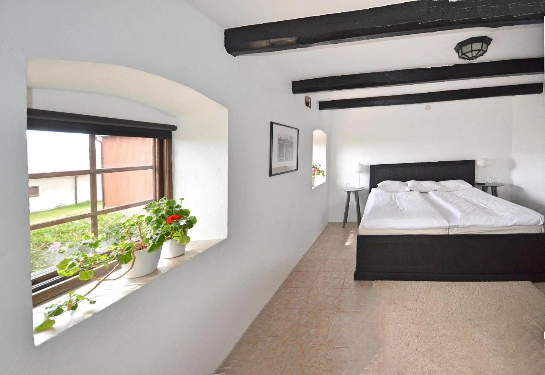 Photo of the whole room, Bed in Gårdshotellet