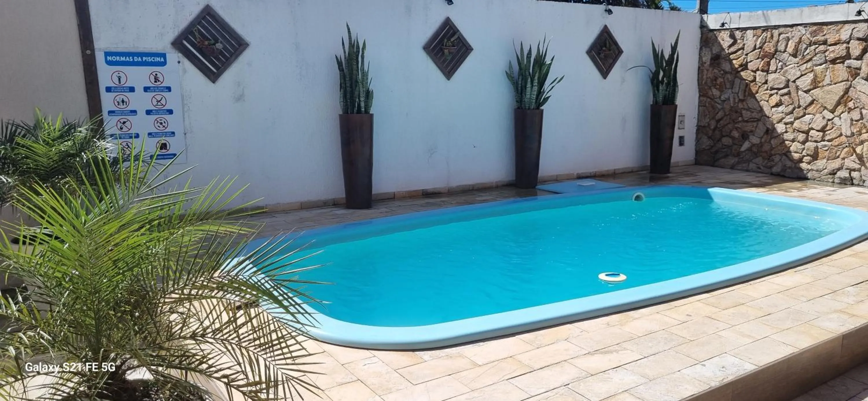 Swimming pool in Pousada Bon Vivant