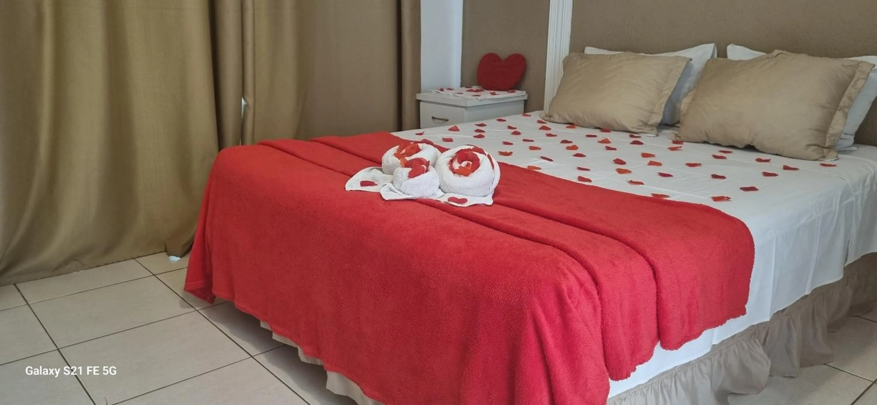 Bed in Pousada Bon Vivant