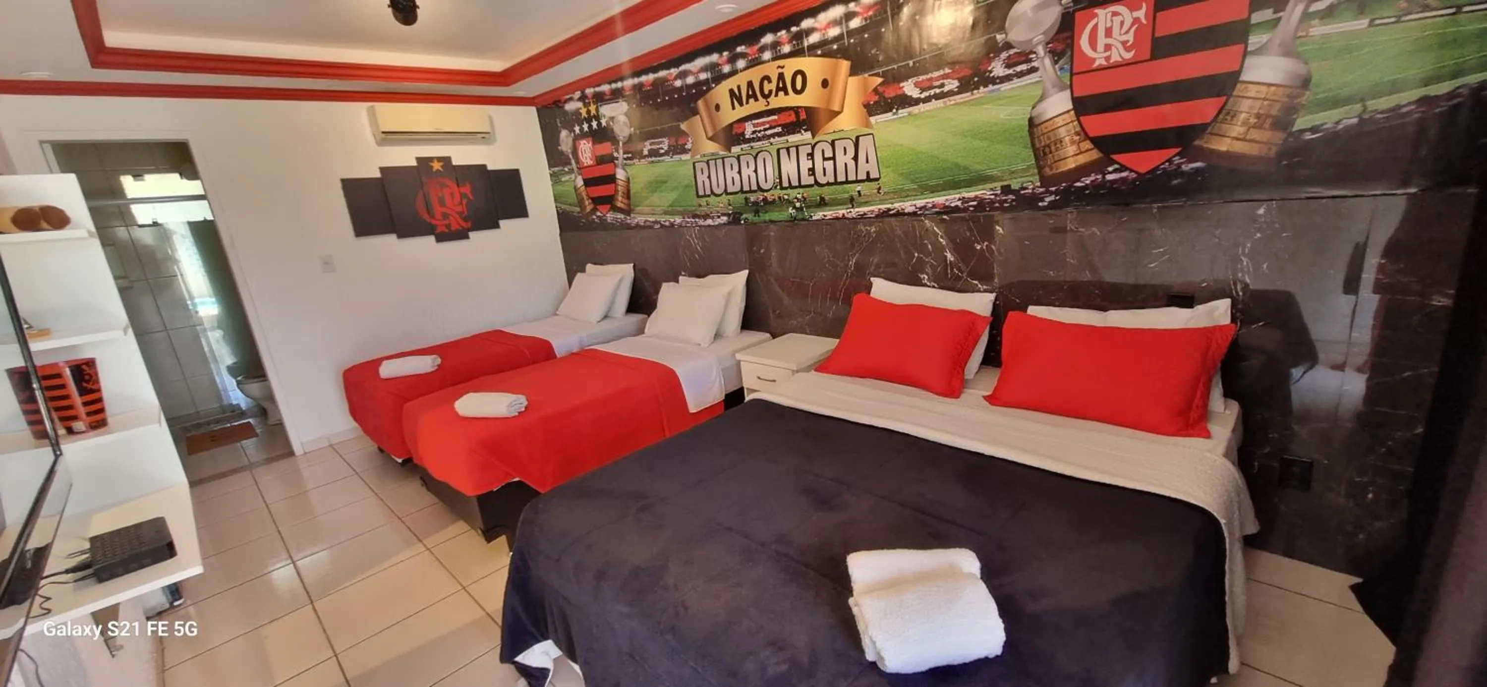 Bed in Pousada Bon Vivant