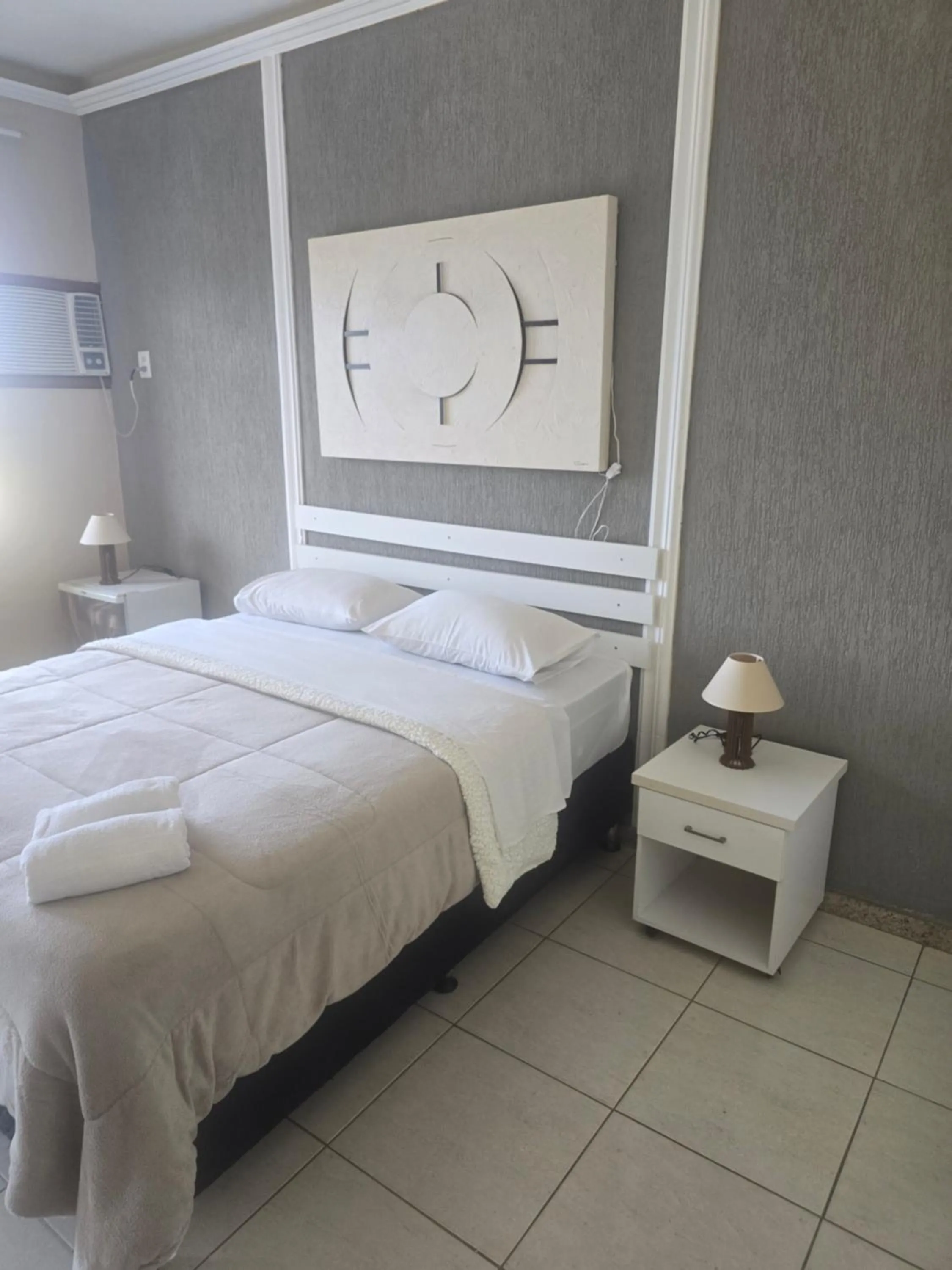 Bed in Pousada Bon Vivant