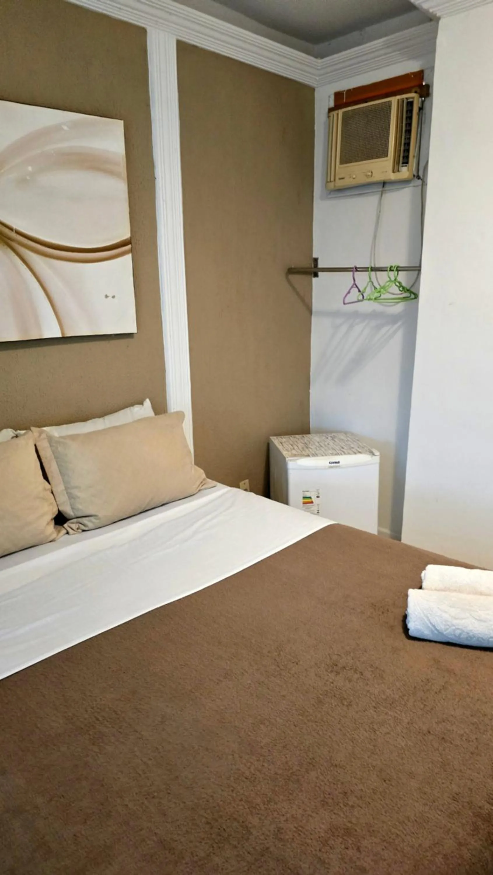 Bed in Pousada Bon Vivant