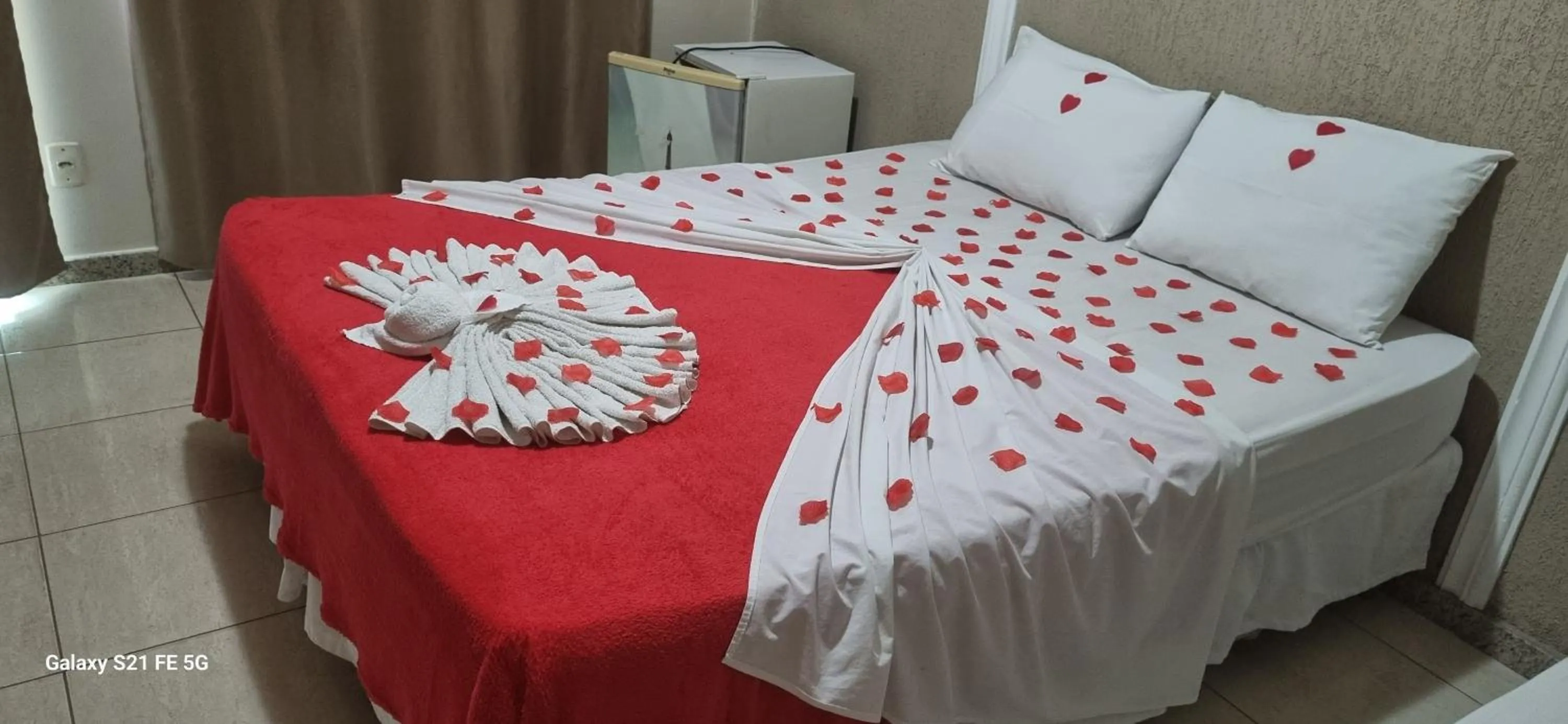 Bed in Pousada Bon Vivant