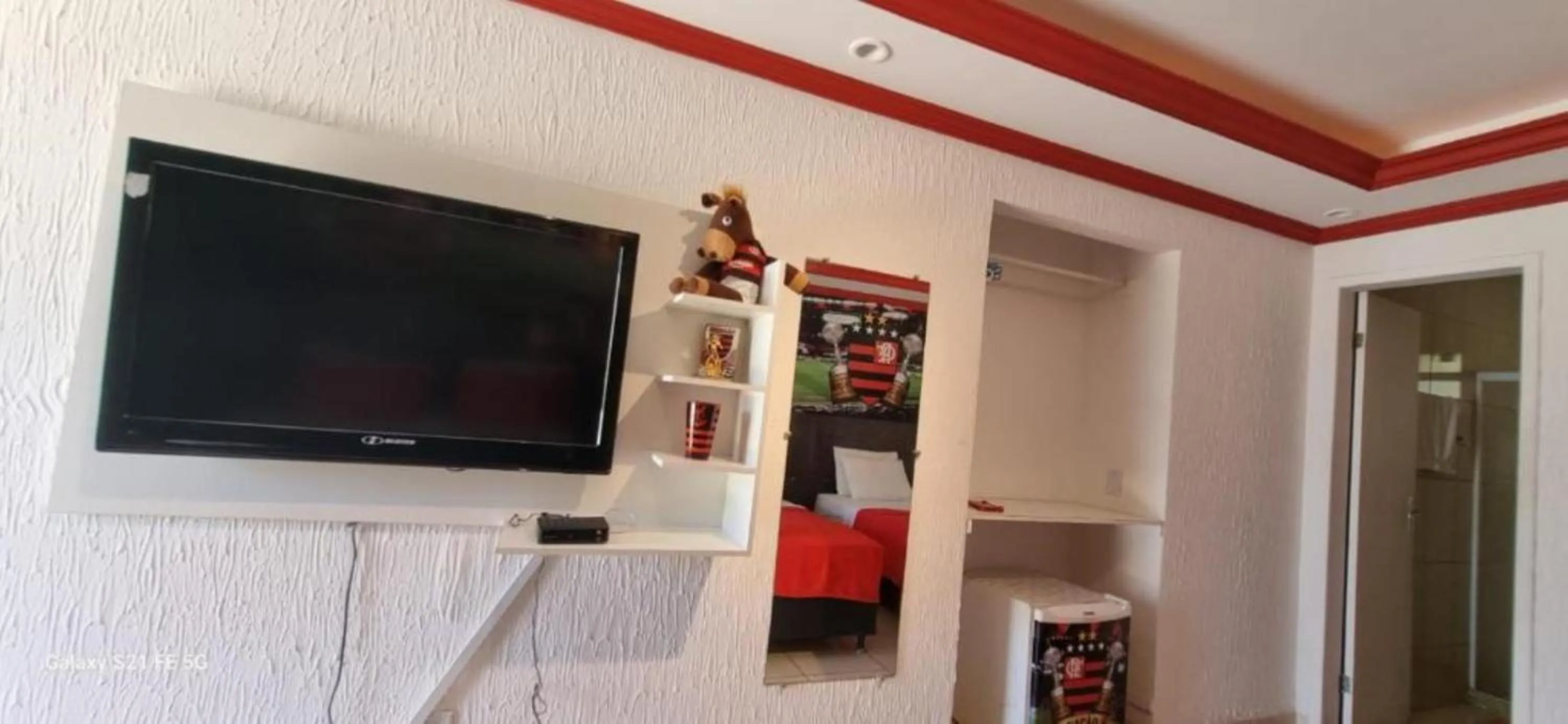 Communal lounge/ TV room in Pousada Bon Vivant