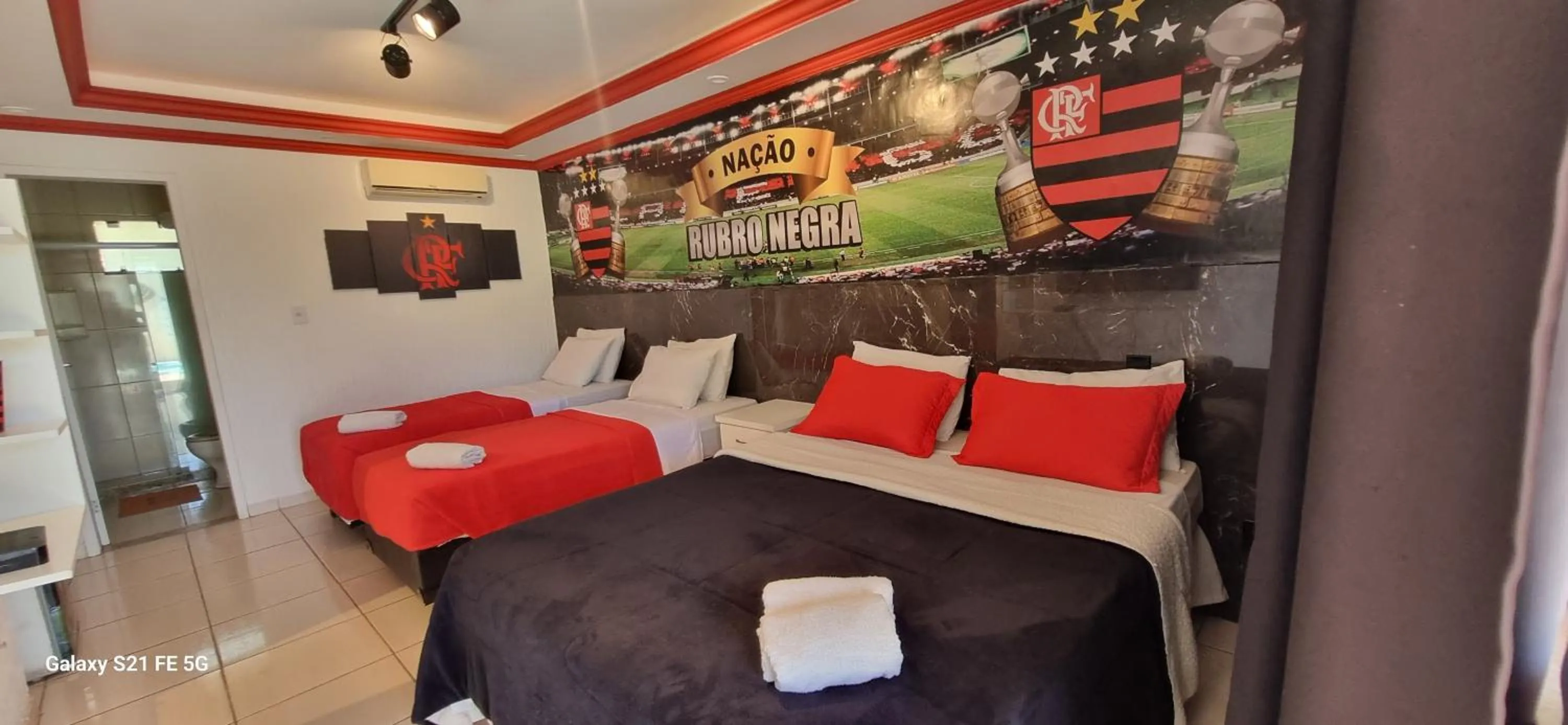 Bed in Pousada Bon Vivant