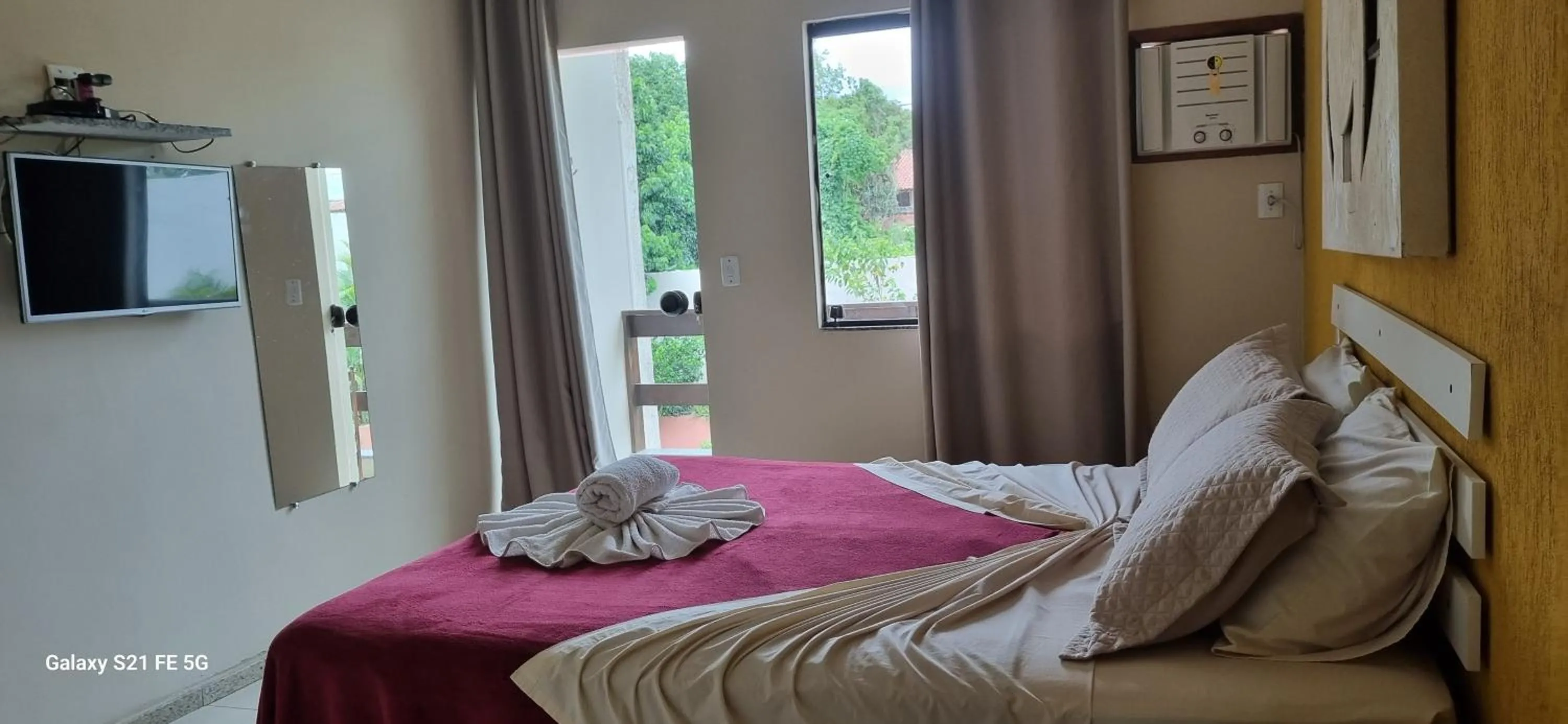 Bed in Pousada Bon Vivant