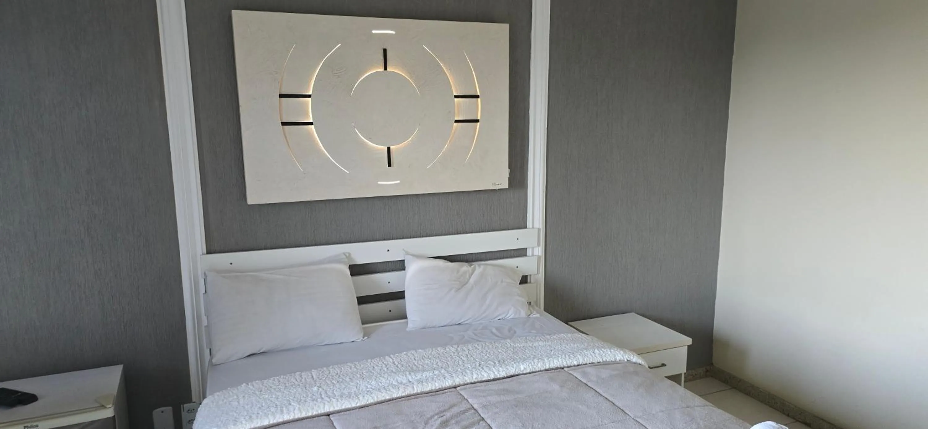 Bed in Pousada Bon Vivant