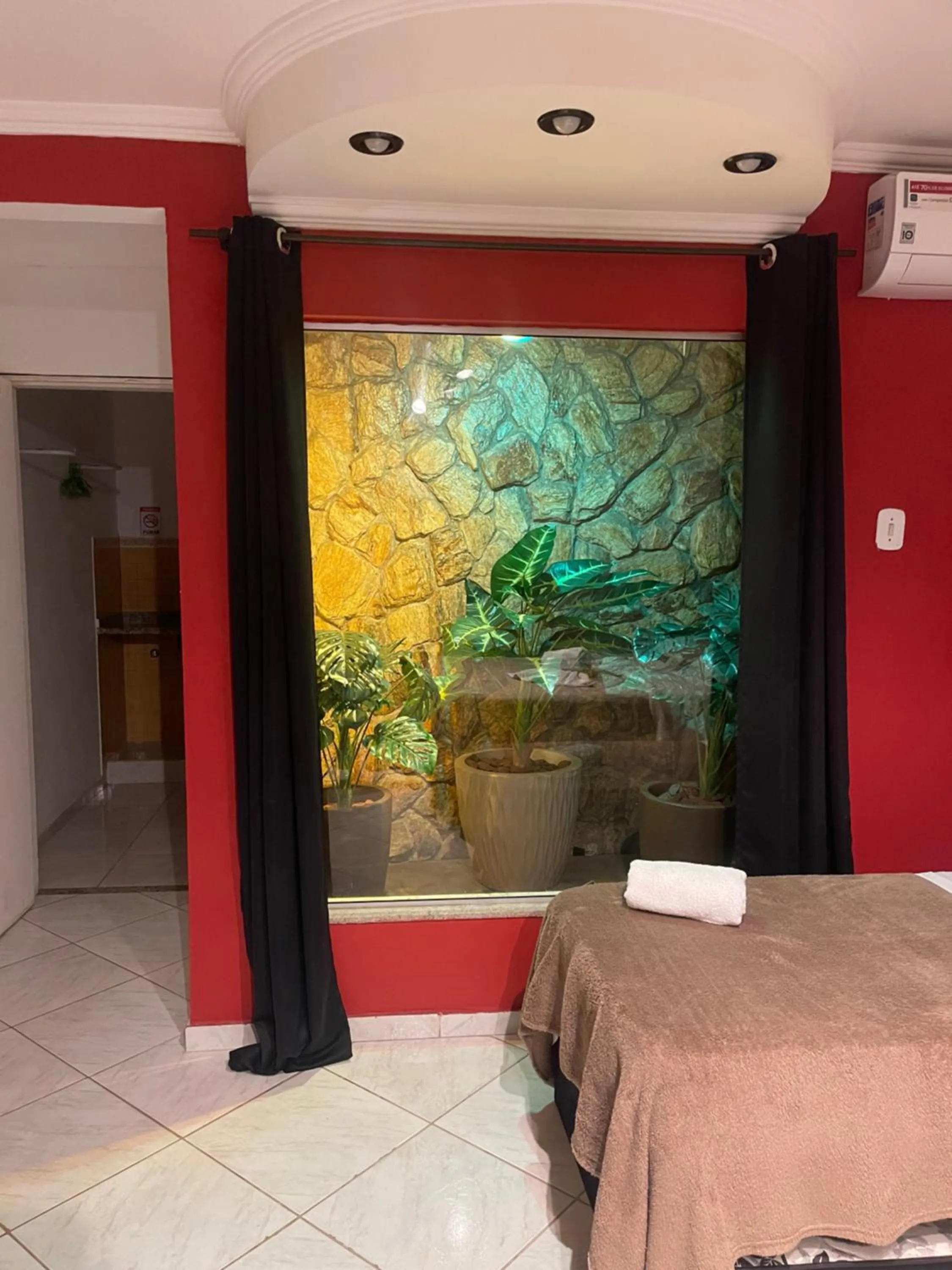 Bed in Pousada Bon Vivant