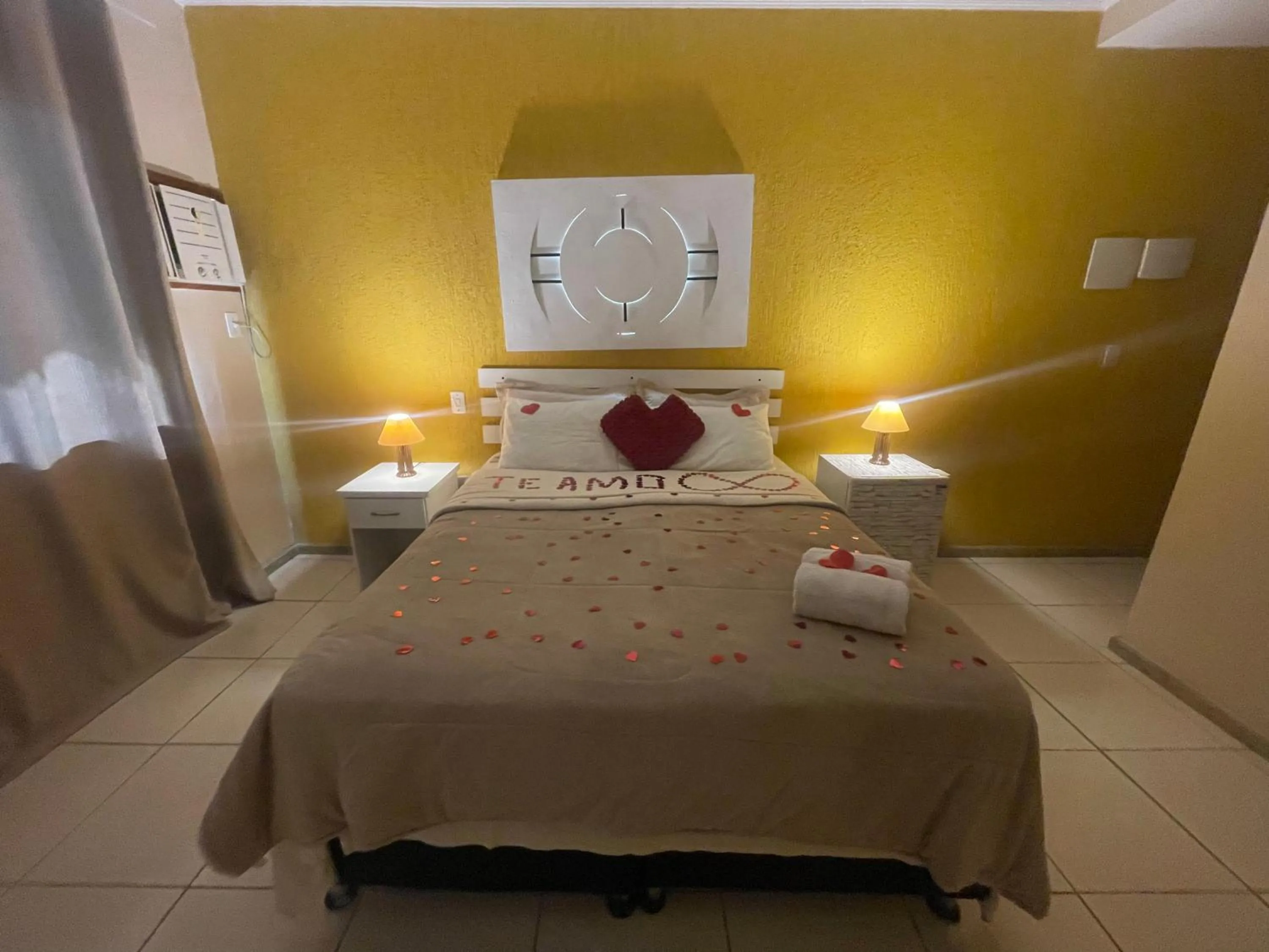 Bed in Pousada Bon Vivant