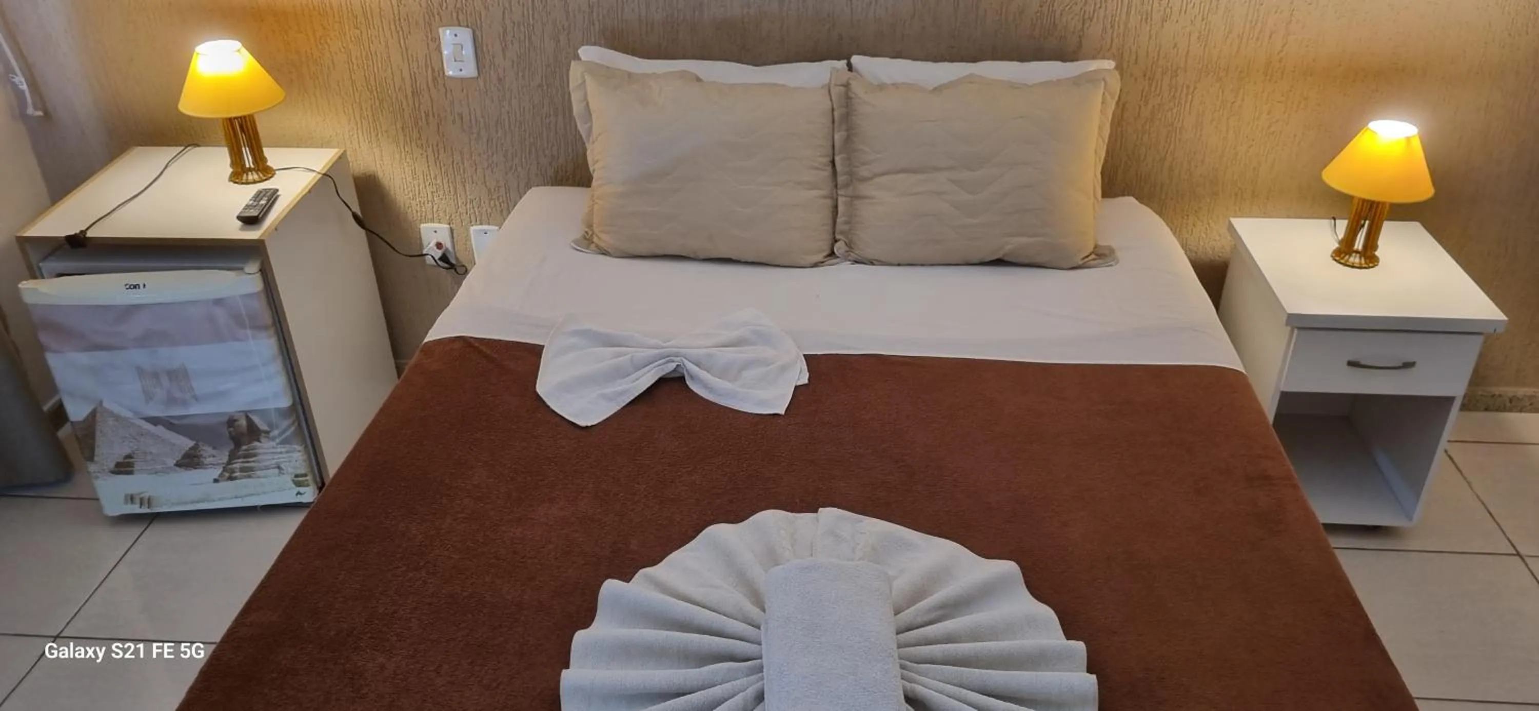 Bed in Pousada Bon Vivant