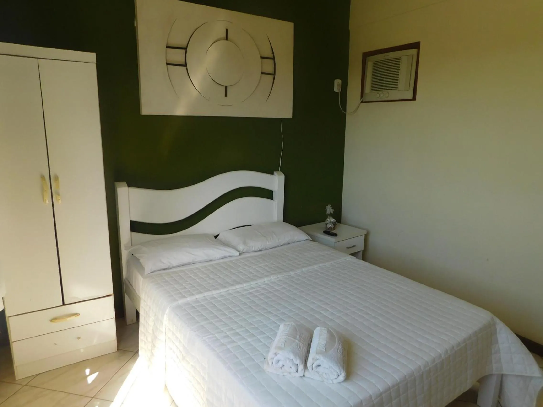Bed in Pousada Bon Vivant