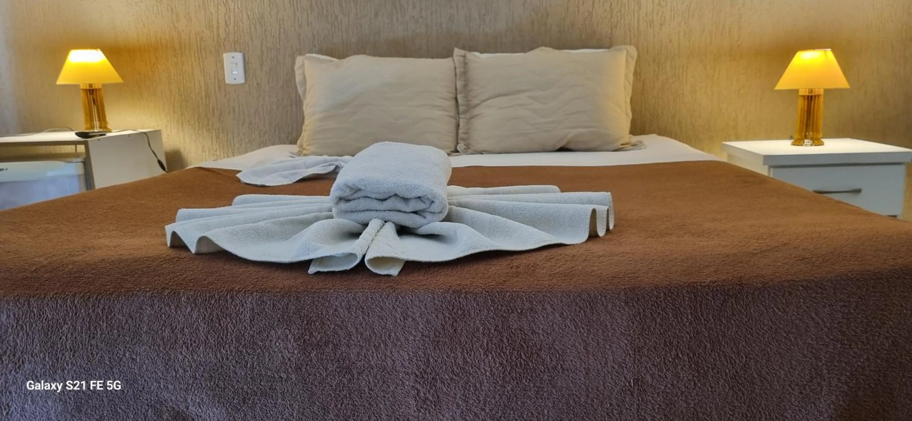 Bed in Pousada Bon Vivant